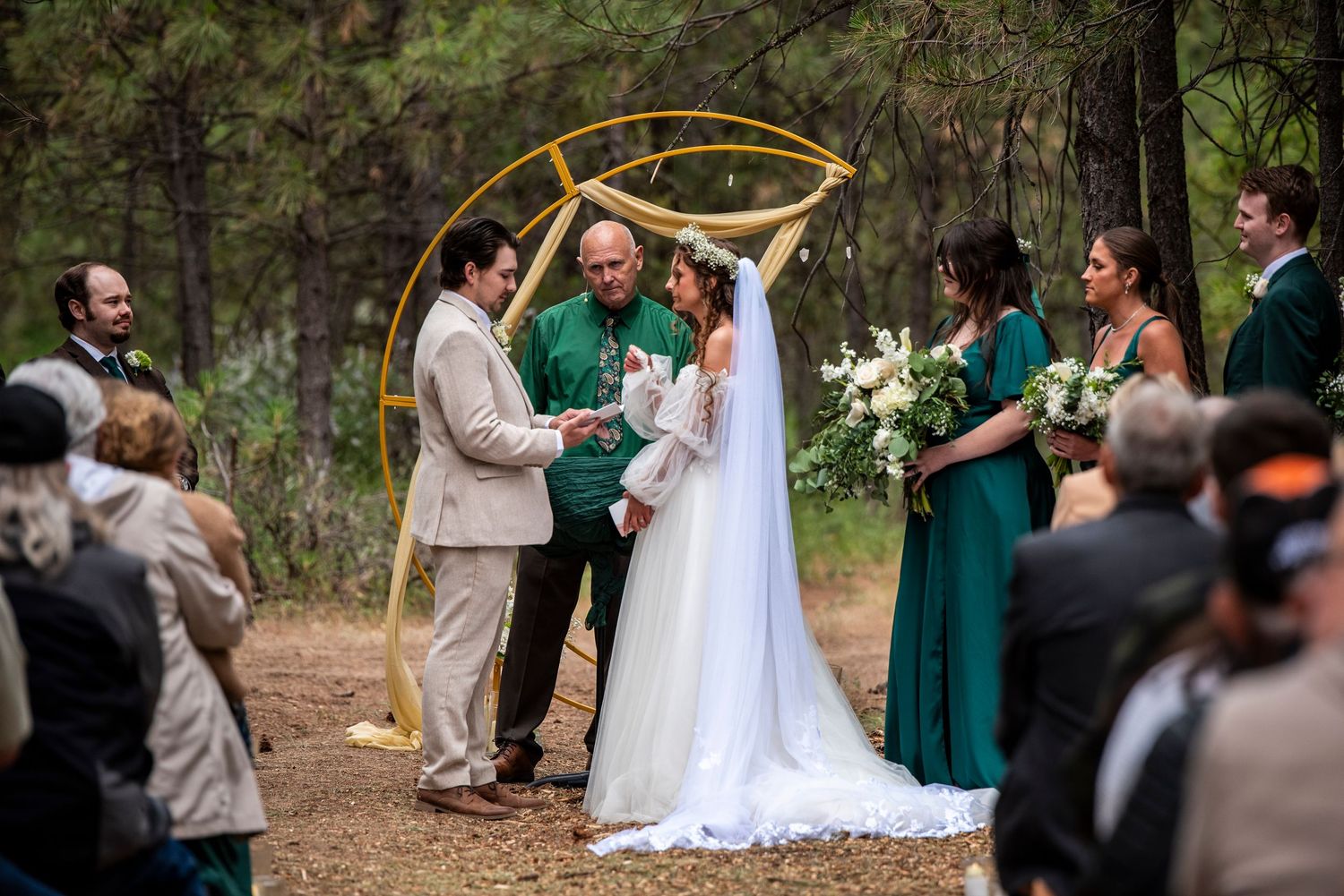 Bride and groom say vows during an oregon wedding ceremony