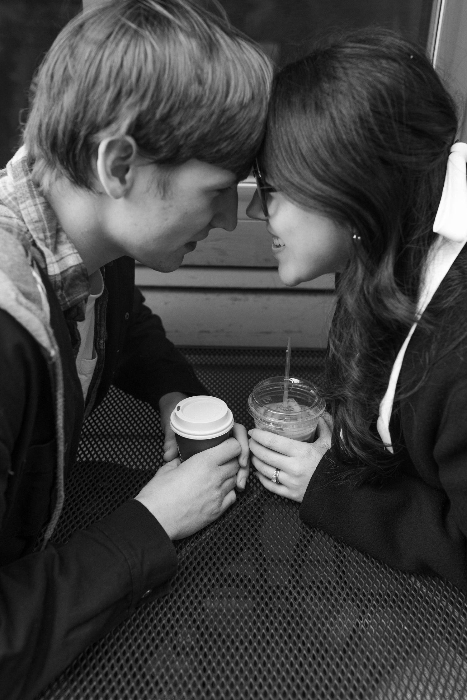 Black and white series of intimate coffee shop moments between two people in East Nashville.