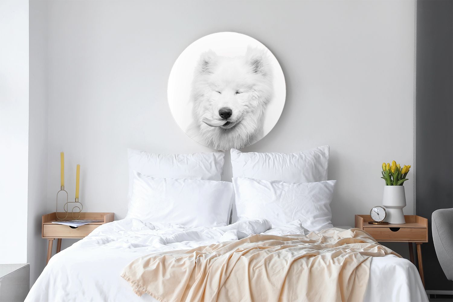 A fluffy white Samoyed dog portrait displayed as circular wall art above a neatly made bed in a modern bedroom.