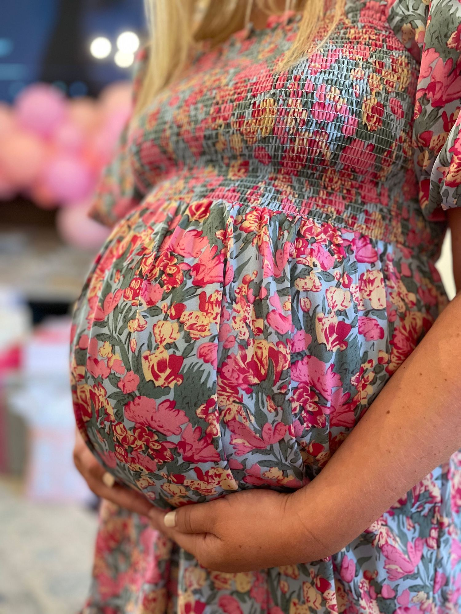 baby shower content pregnant mother holding baby bump
