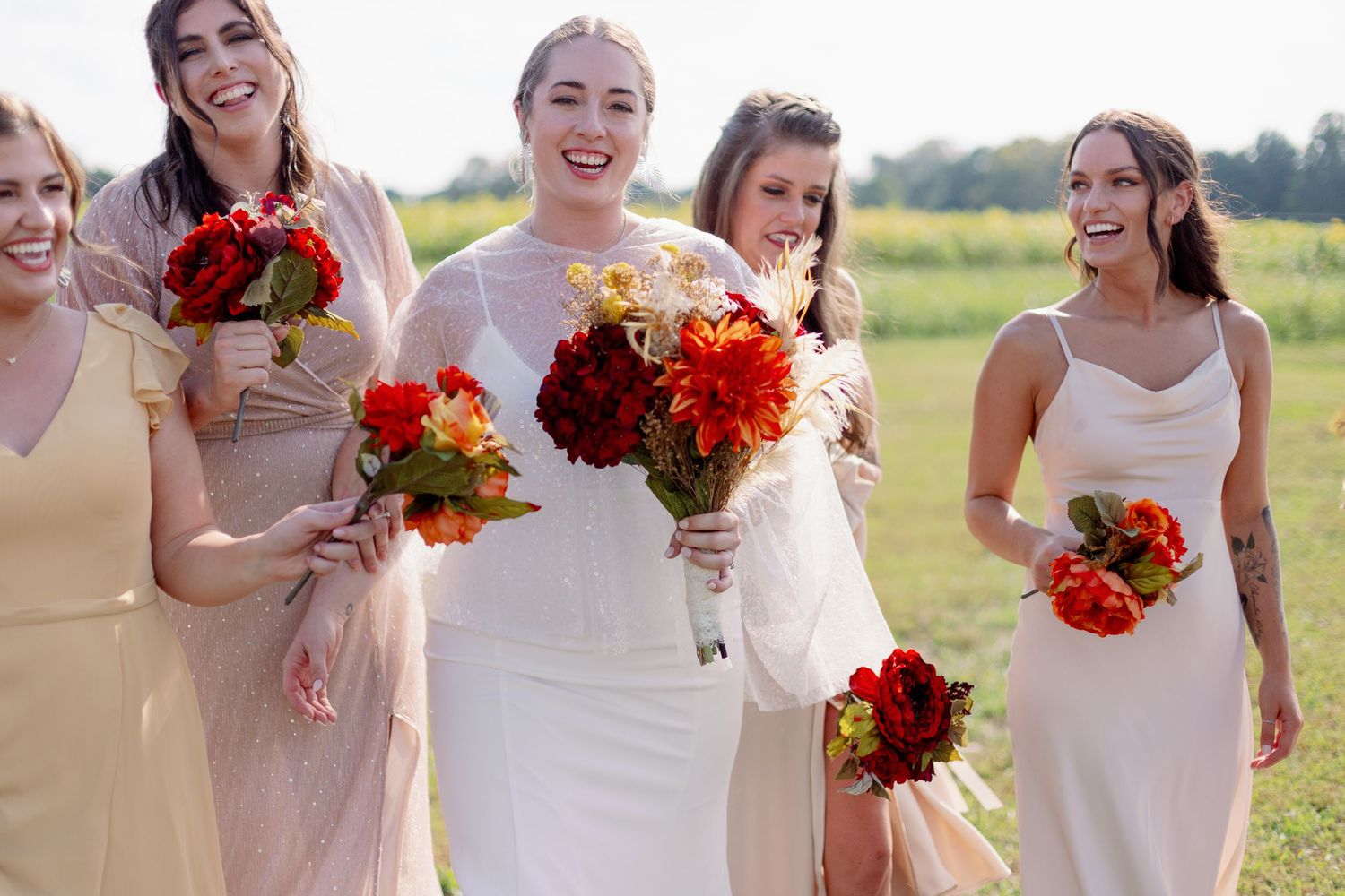 bride walks with bridesmaids