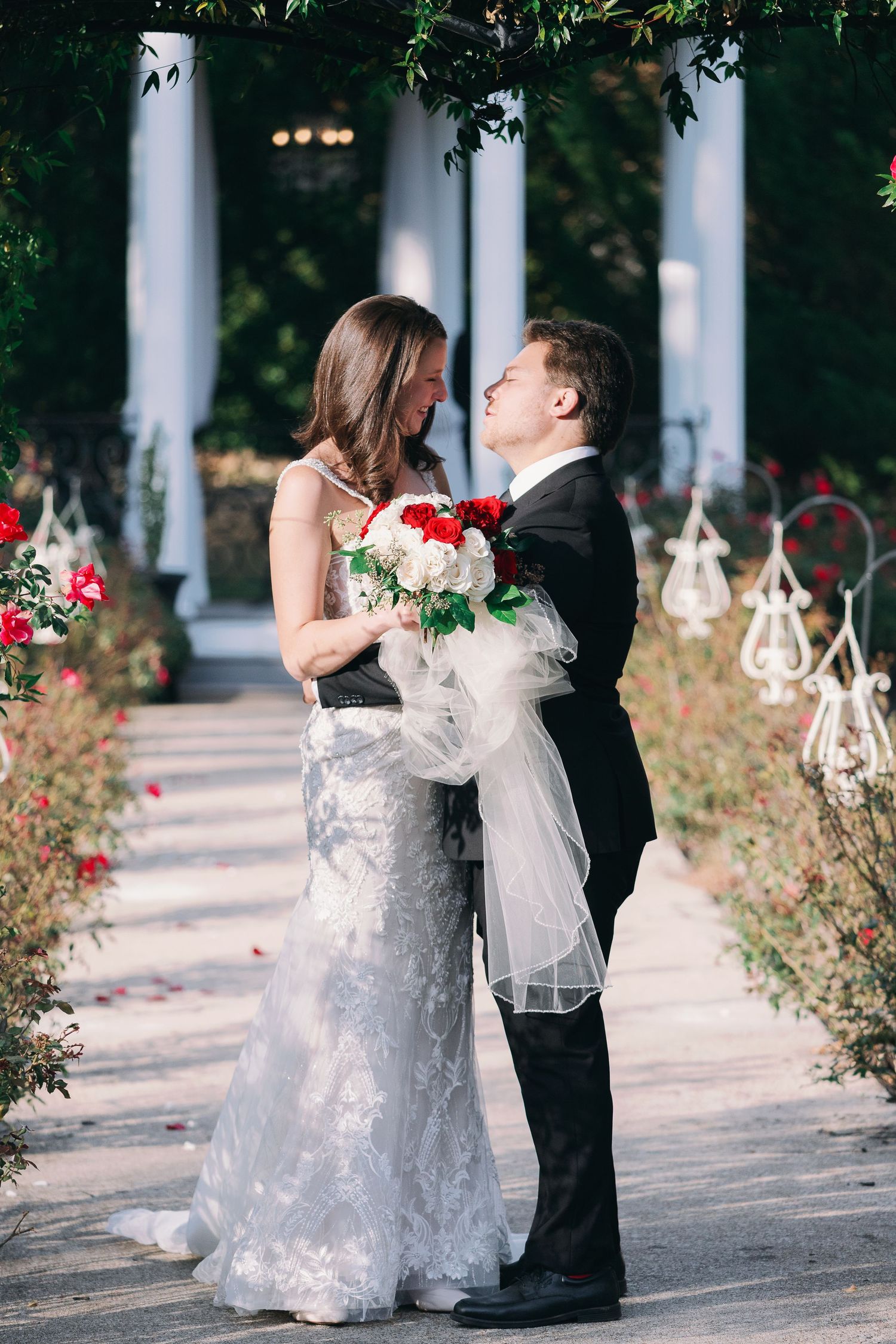 bride and groom look at eachother as they get married