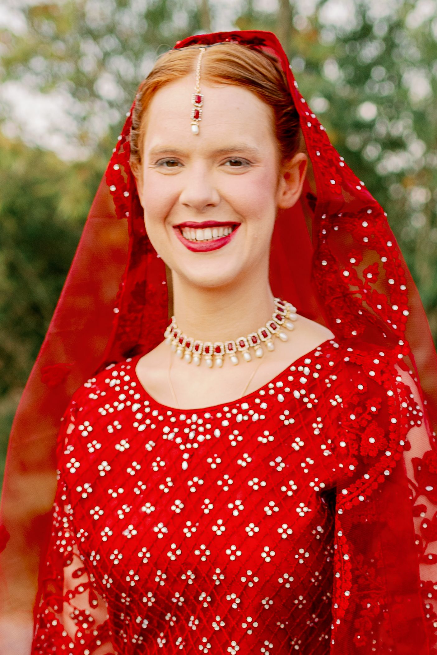 bride in red garments for hindu wedding