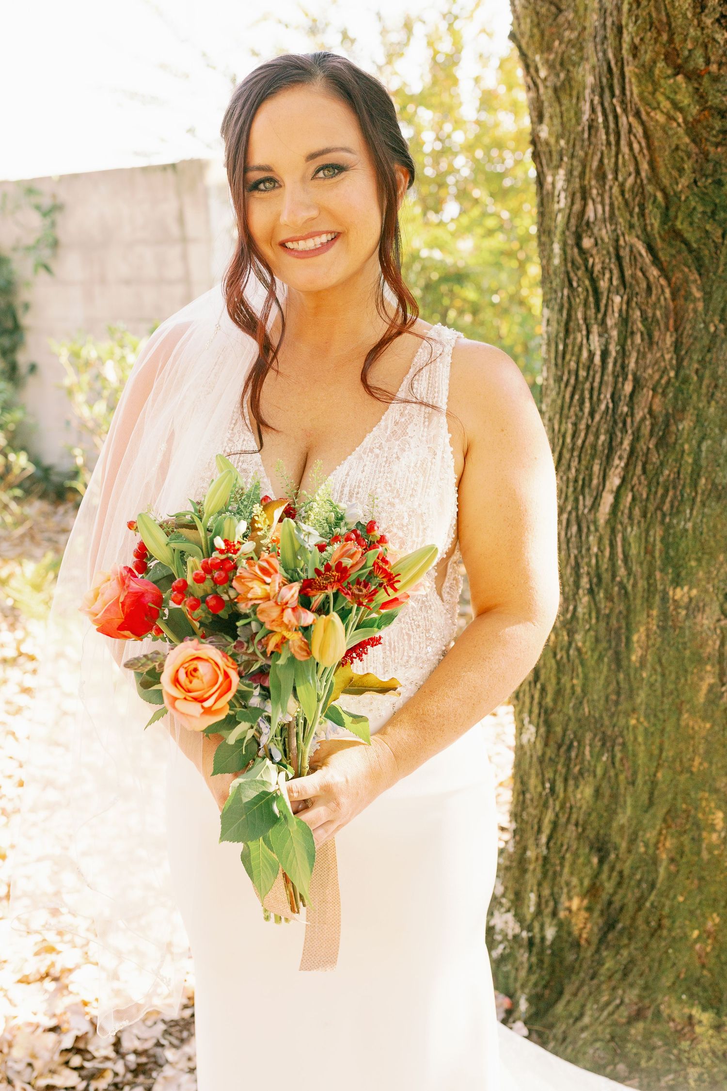bride holds bridal bouquet for portrait