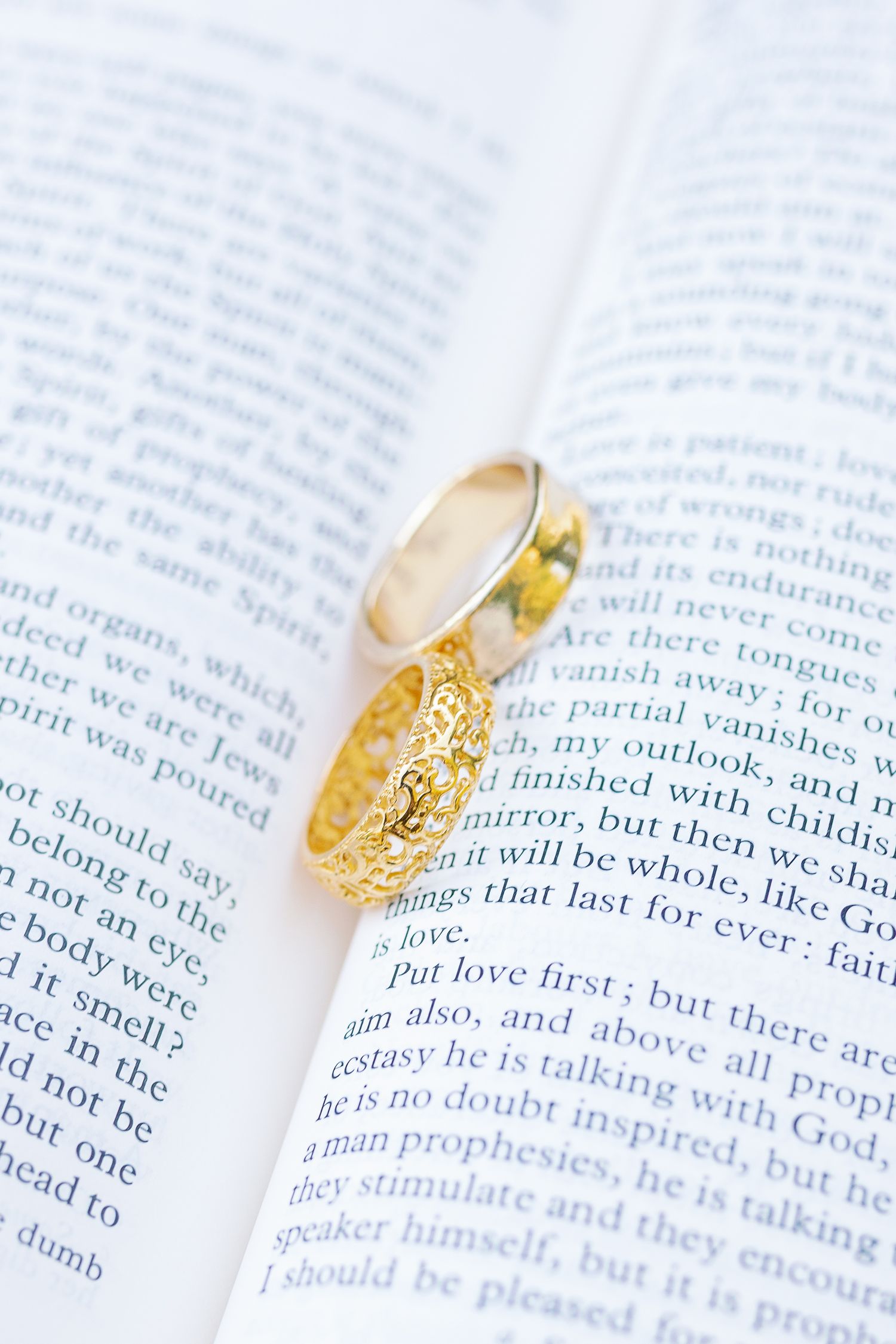 weddings rings layed in bible