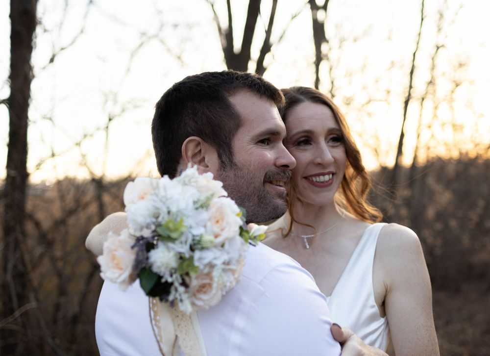 Intimate wedding couple portrait at sunset with soft natural lighting. Mauston photographer.