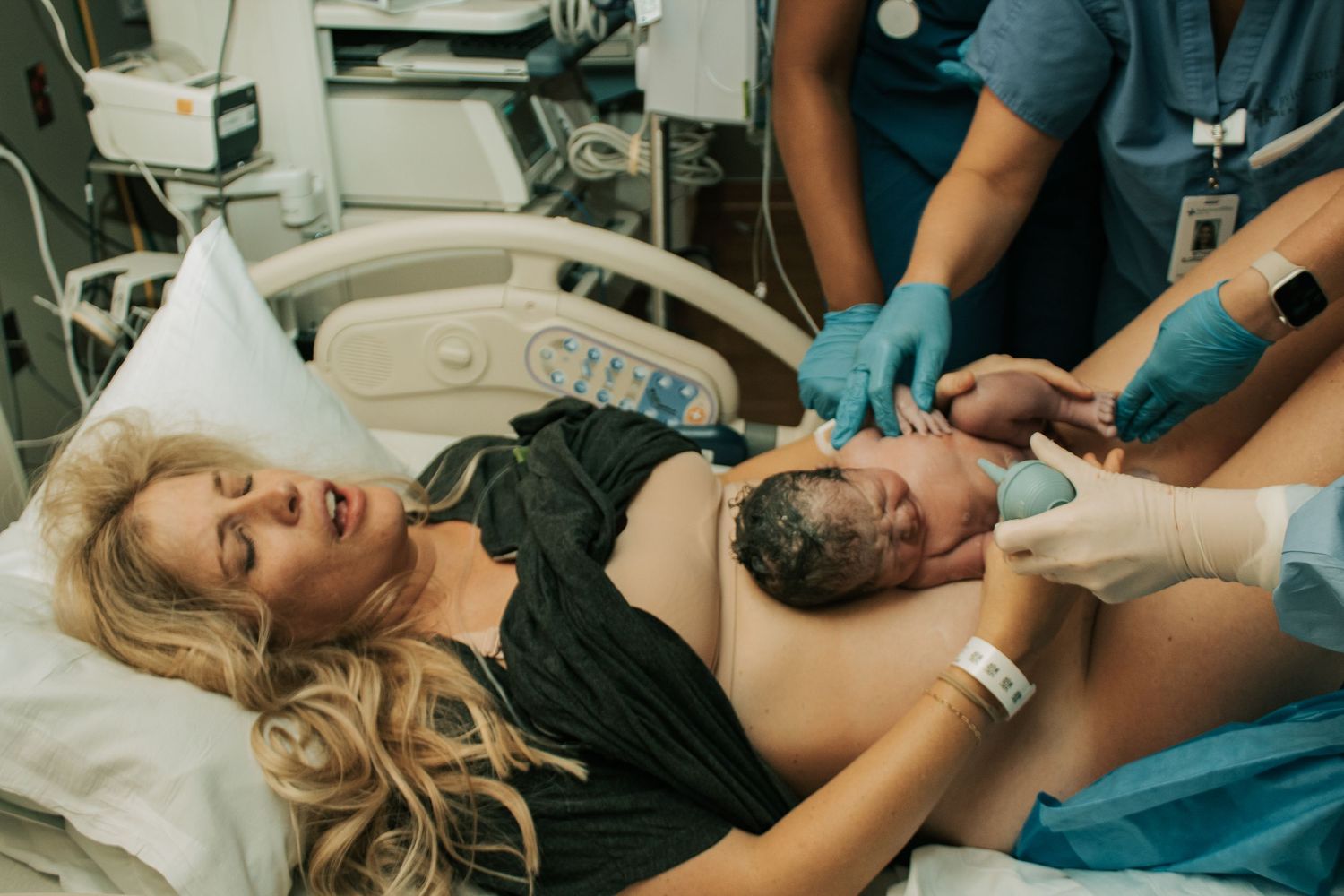 Copperas Cove Birth Photographer captures mom holding baby for first time.