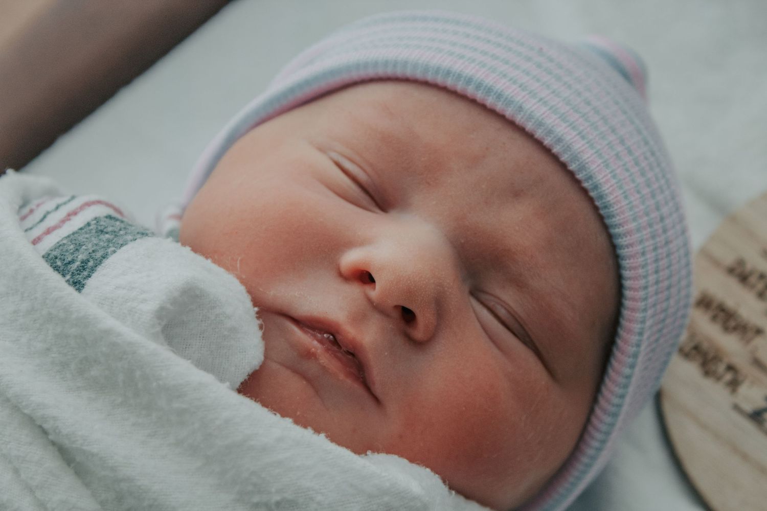 Georgetown Birth Photographer captures newborn baby face.