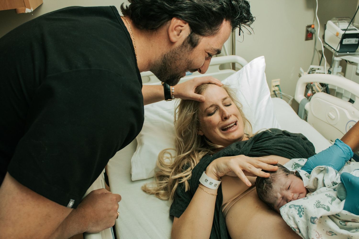 Copperas Cove Birth Photographer captures mother emotion immediately after birth with support of husband.