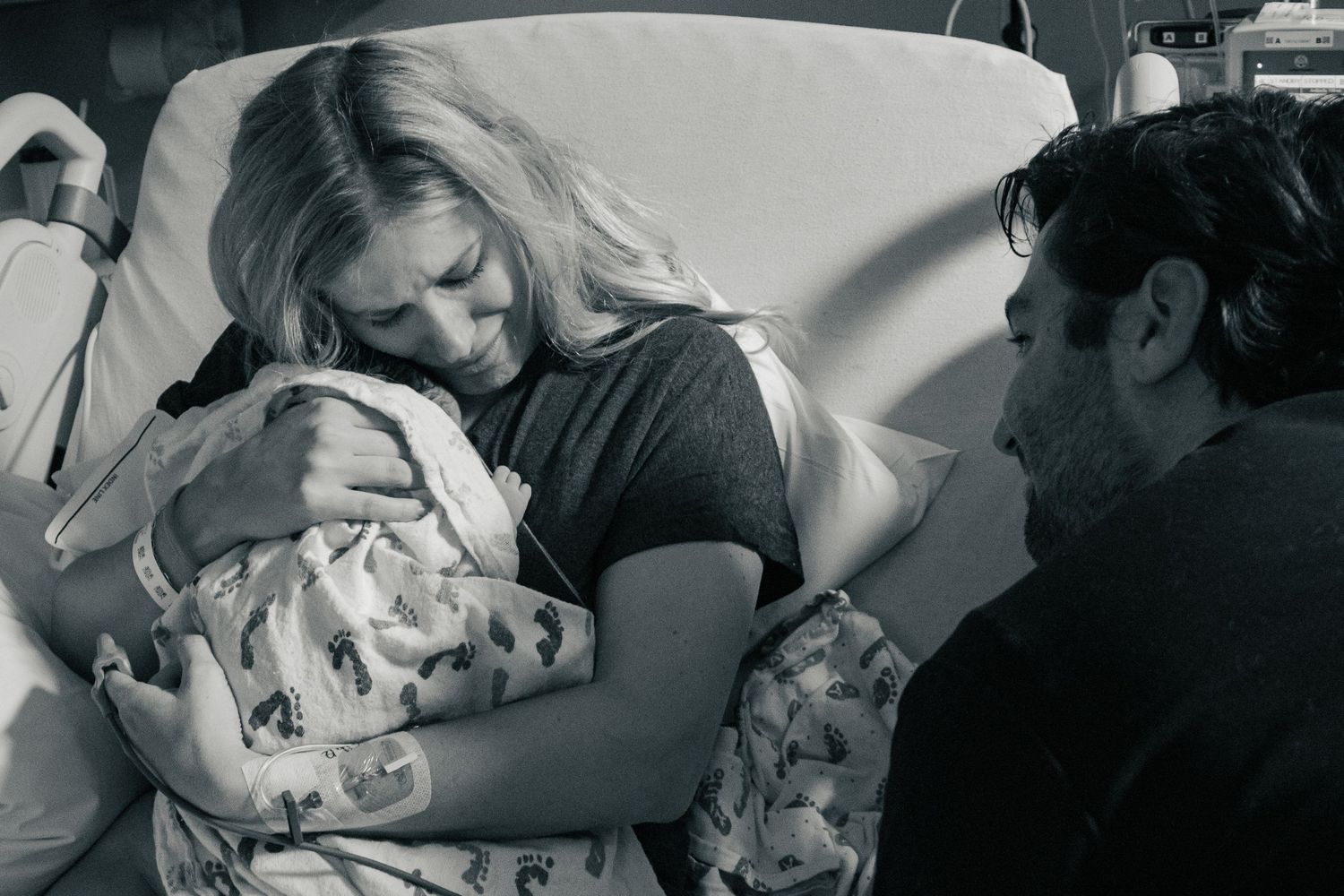 Copperas Cove Birth Photographer captures tender moment between mother, father and baby shortly after birth