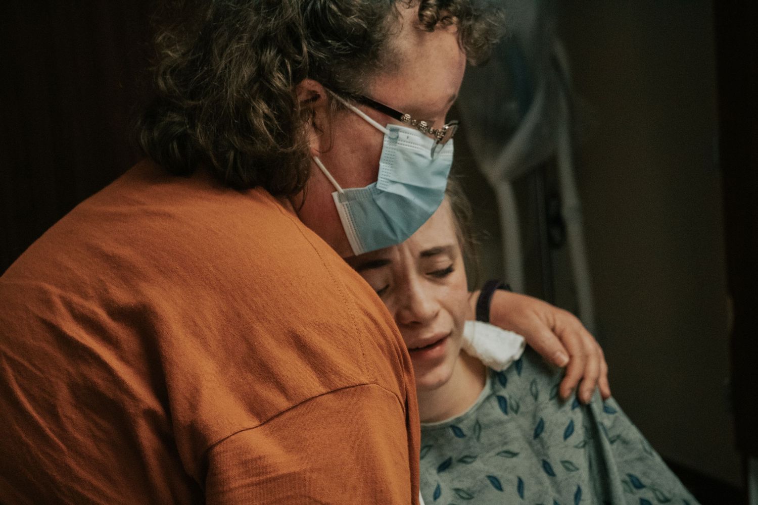 Copperas Cove doula capturing mother supporting her daughter in labor at hospital.