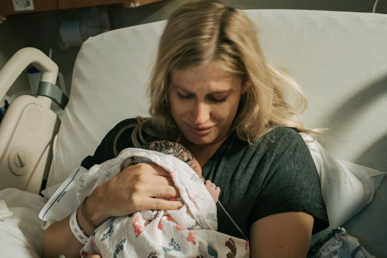 Copperas Cove Birth Photographer captures mother holding newborn baby.