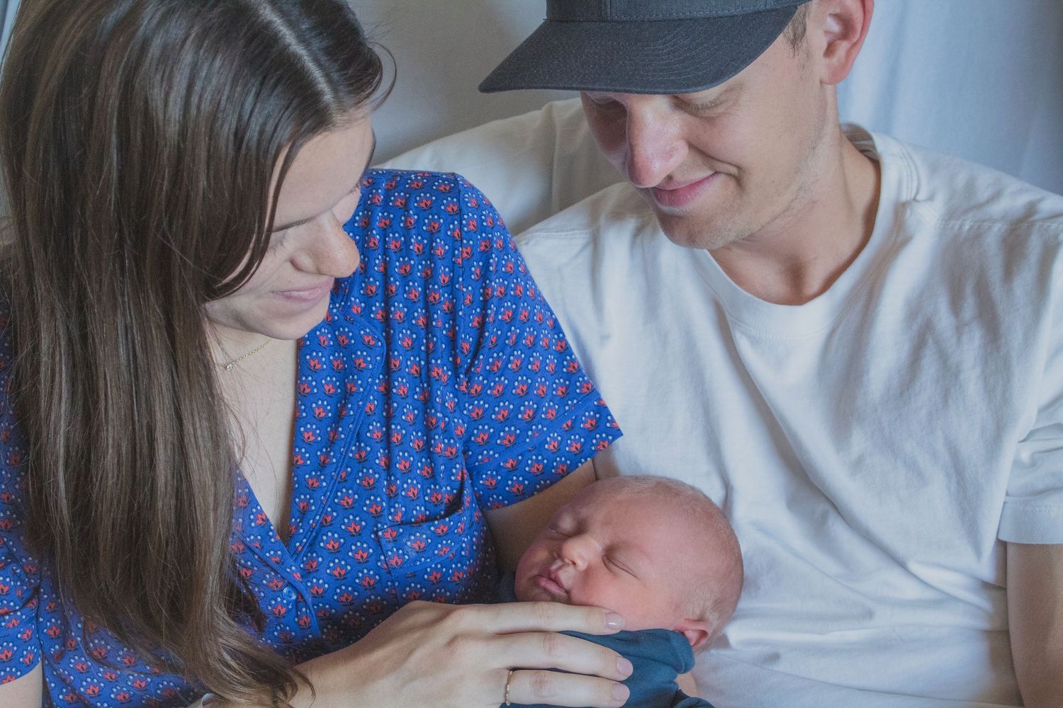 Copperas Cove Fresh 48 Photographer capturing parents holding newborn baby.