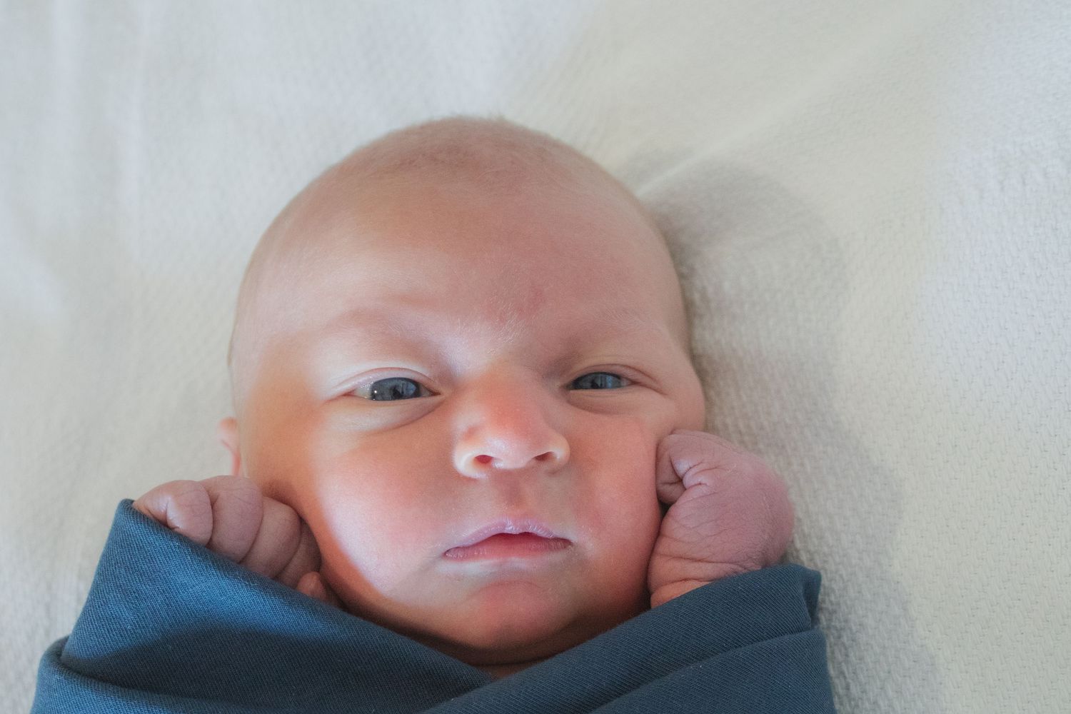 Copperas Cove Fresh 48 Photographer capturing newborn baby.