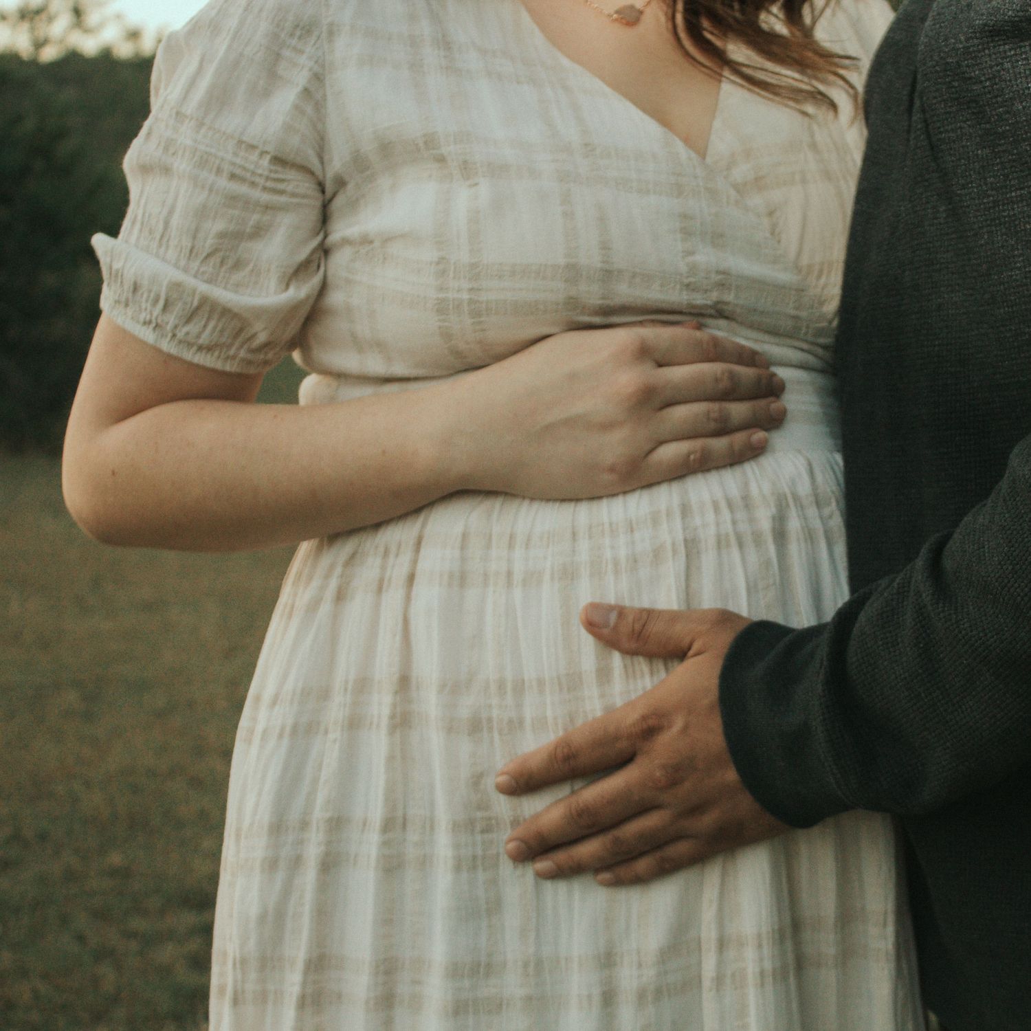 Copperas Cove Maternity photographer capturing pregnant mother and father.
