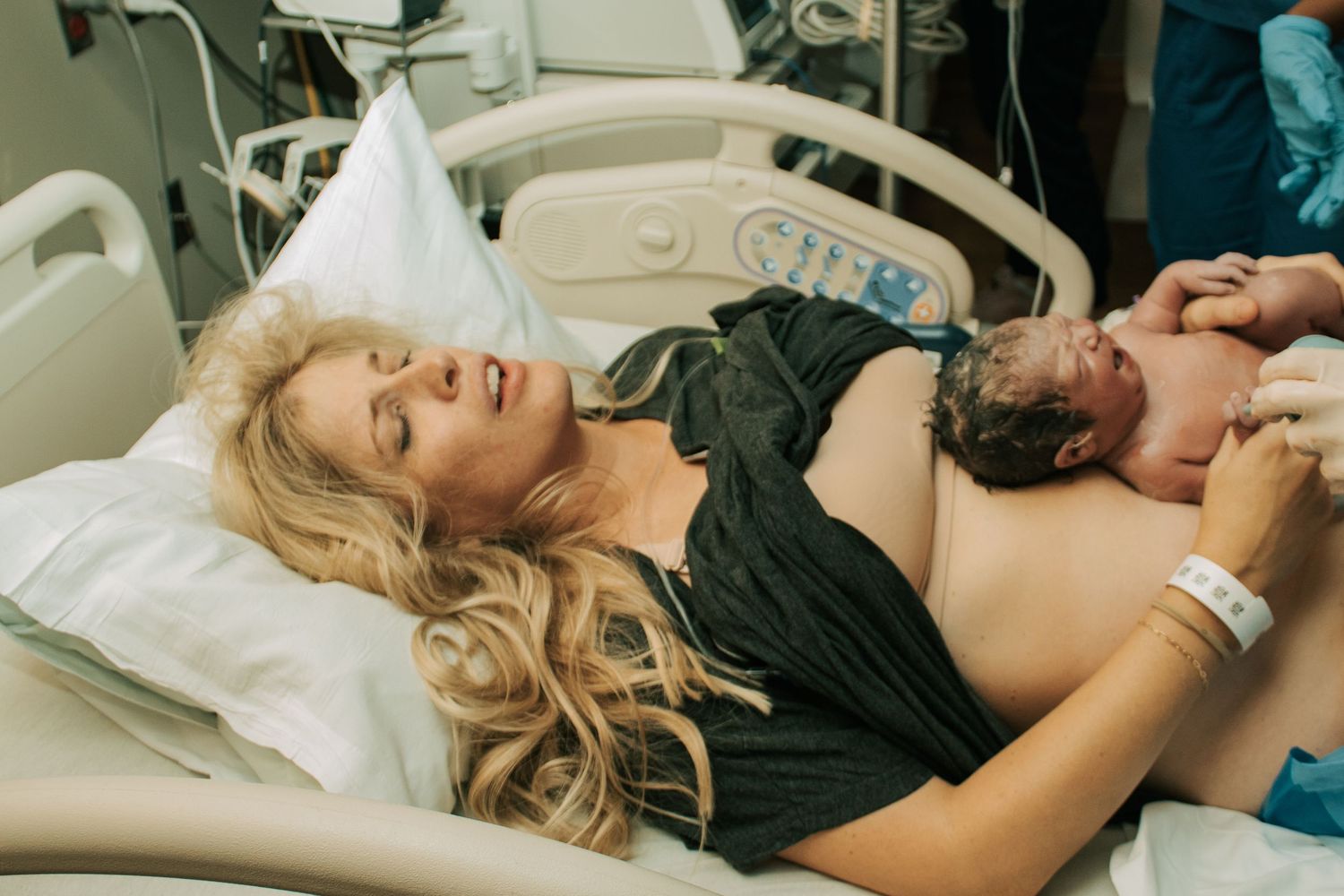 Copperas Cove Birth Photographer captures woman moments after pushing out a baby