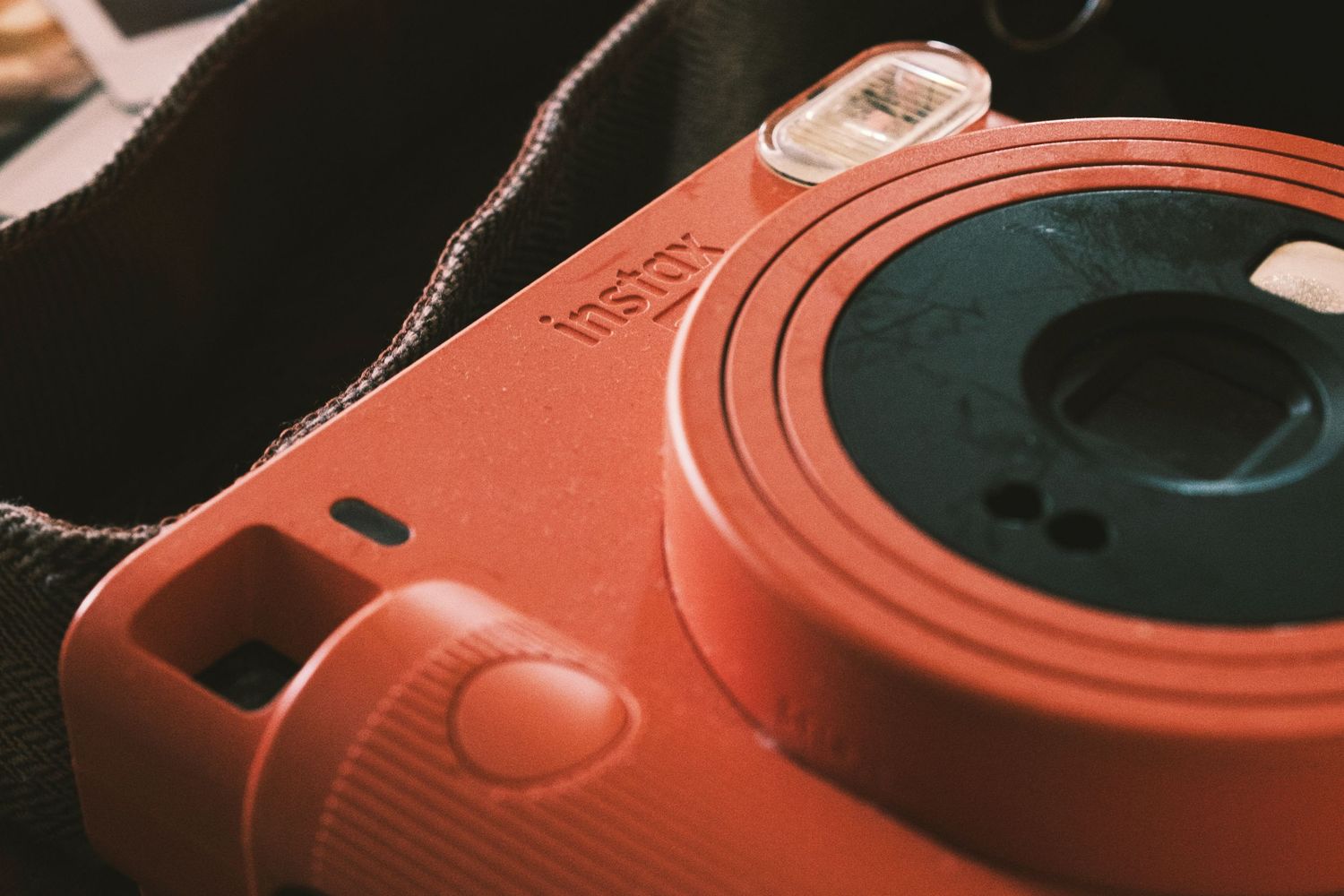Close-up detail shots of vintage camera lenses and equipment in warm tones.