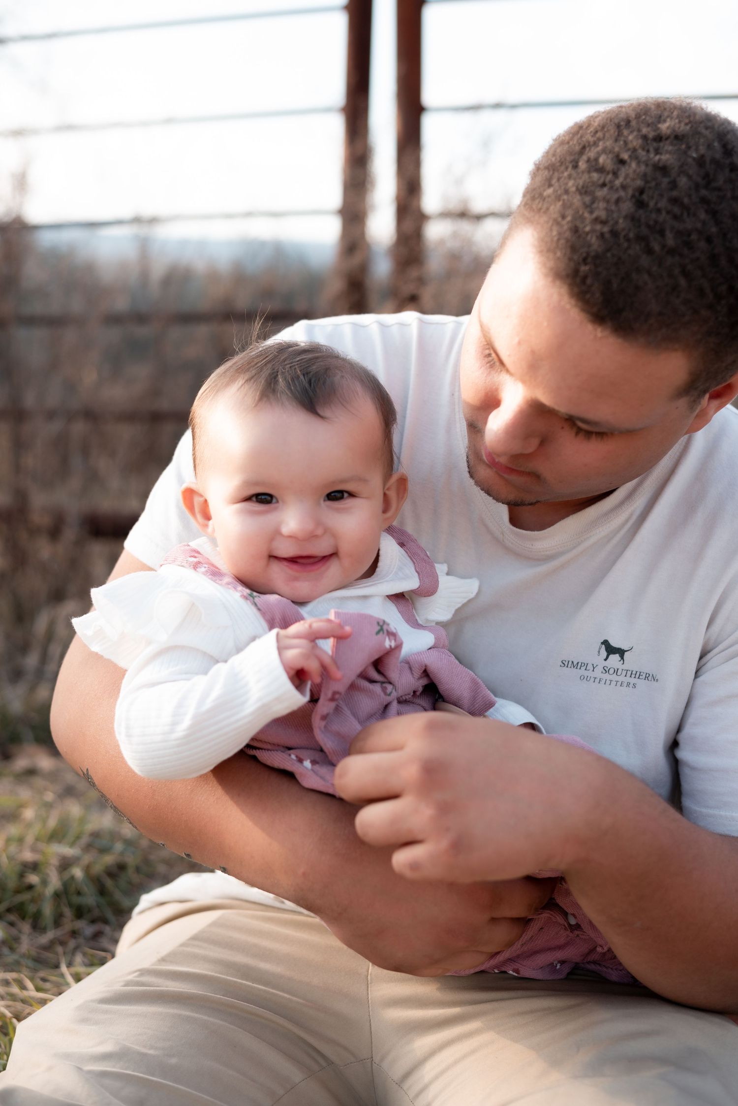A tender moment captured in a series of close-up shots showing gentle interaction with a baby in white clothing.