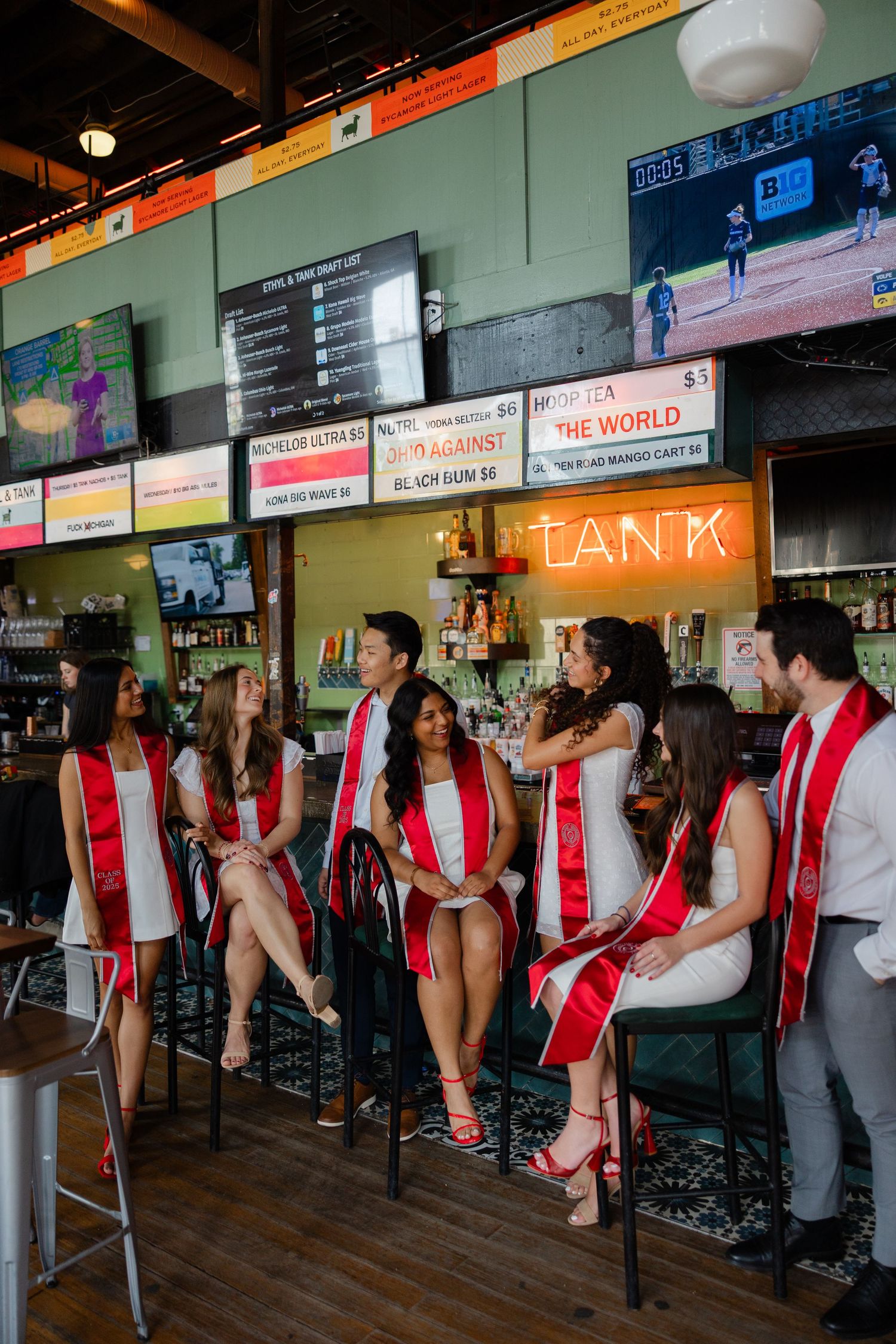 Columbus Ohio photographer for Ohio State graduation photos. Campus bar ethyl photos