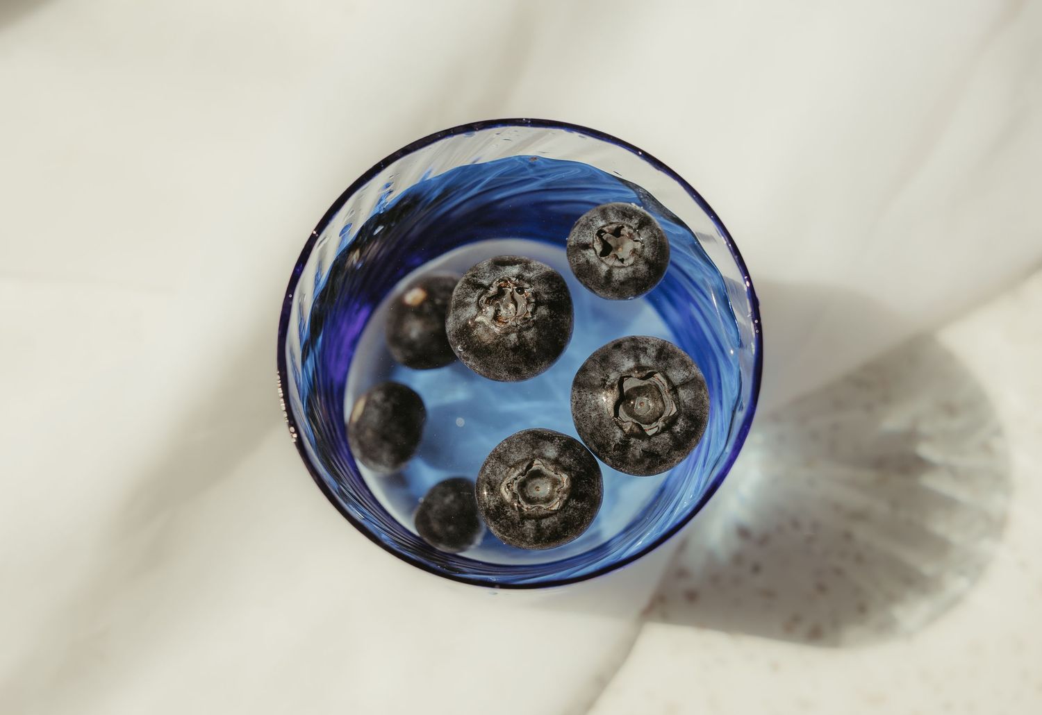 Bowl of berries on table
Decorative bowl of berries in soft morning light during a lifestyle home photography session.