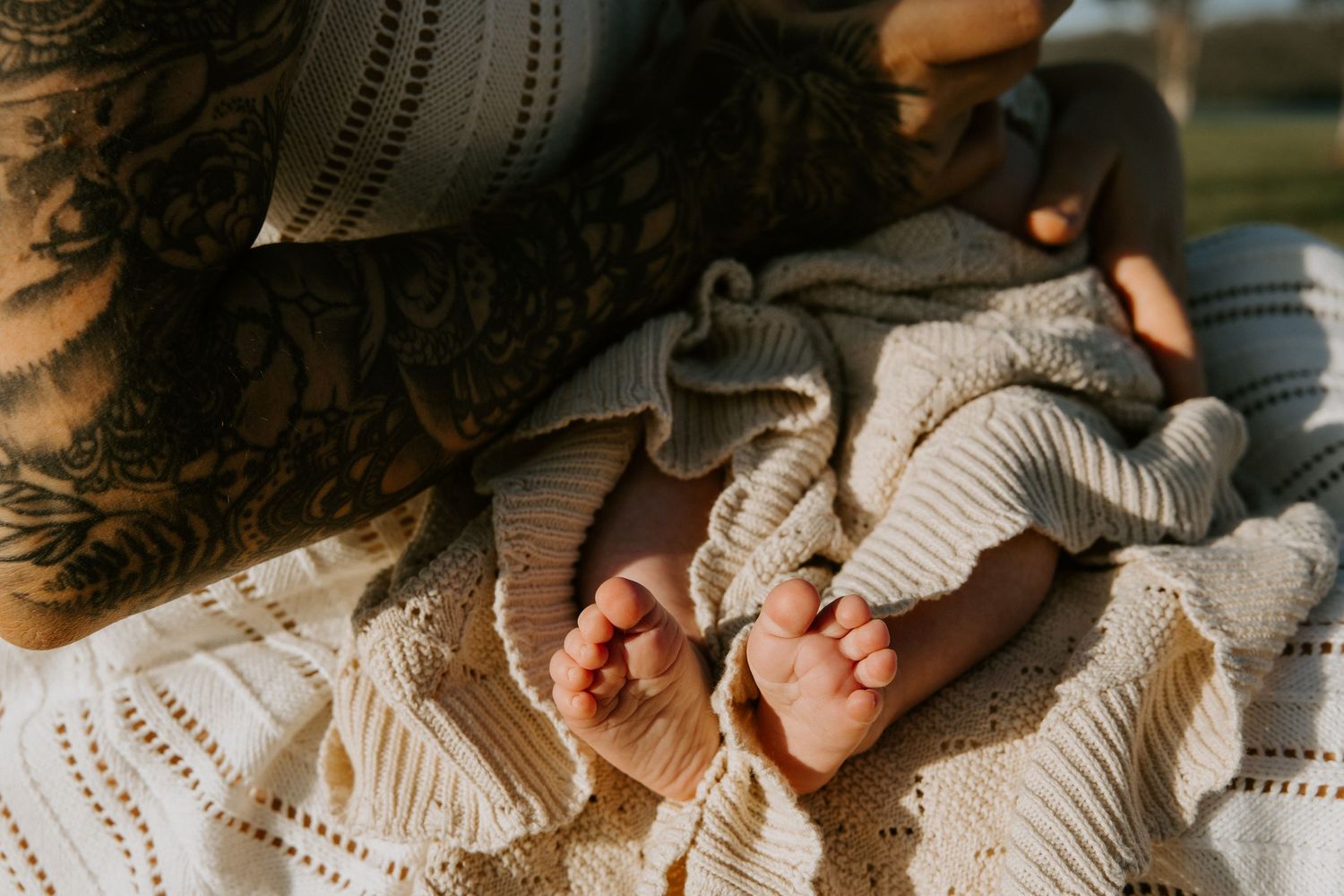 Newborn feet wrapped in blanket
Newborn’s tiny feet wrapped warmly in a blanket during an in-home newborn session.