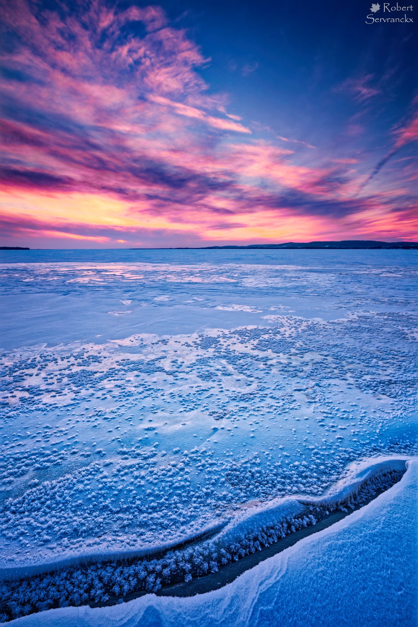 Winter Sunset over Lake of Two Mountains. Quebec - Coucher de soleil hivernal sur le Lac des Deux-Montagnes, Québec