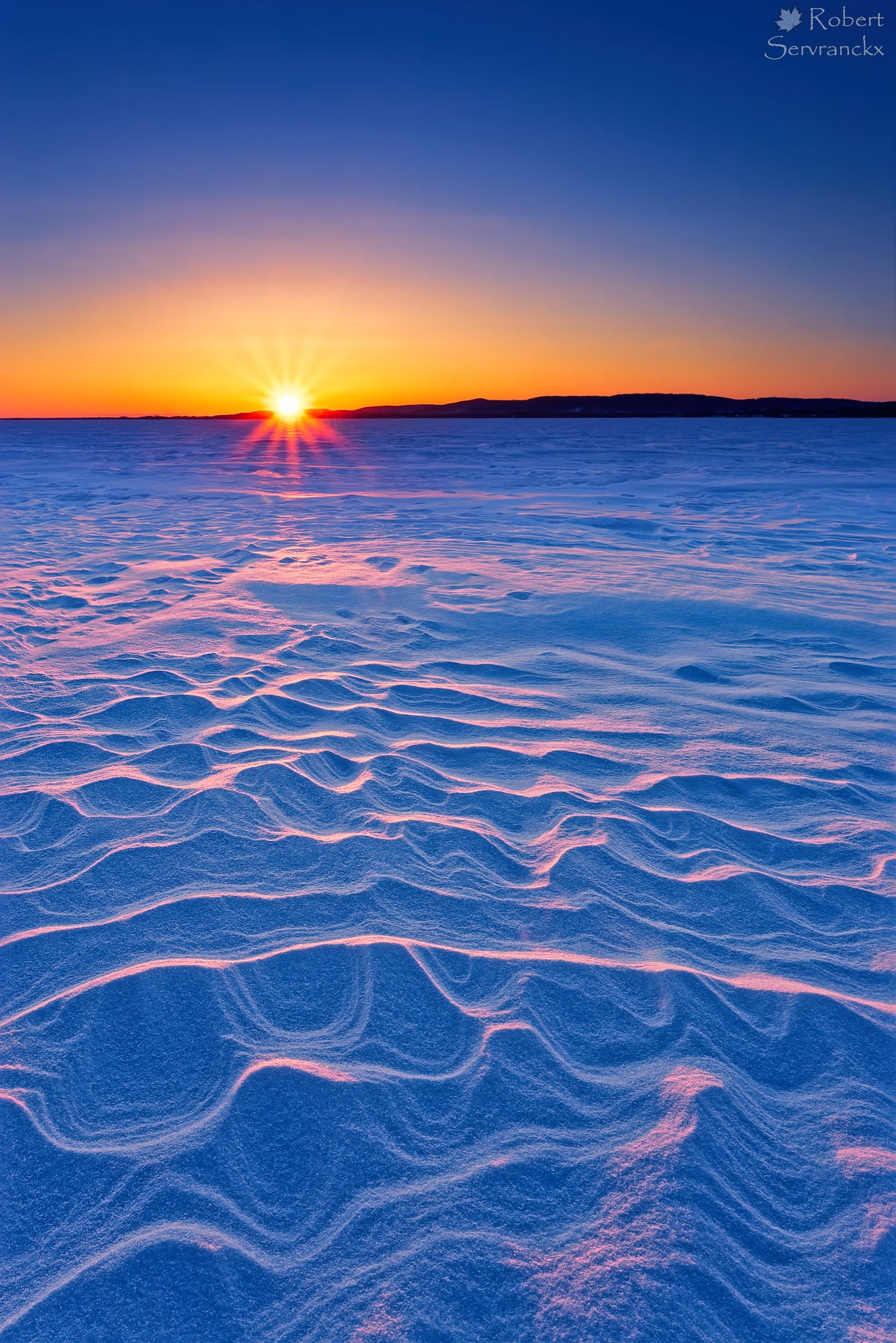 Winter Sunset over Lake of Two Mountains. Quebec - Coucher de soleil hivernal sur le Lac des Deux-Montagnes, Québec