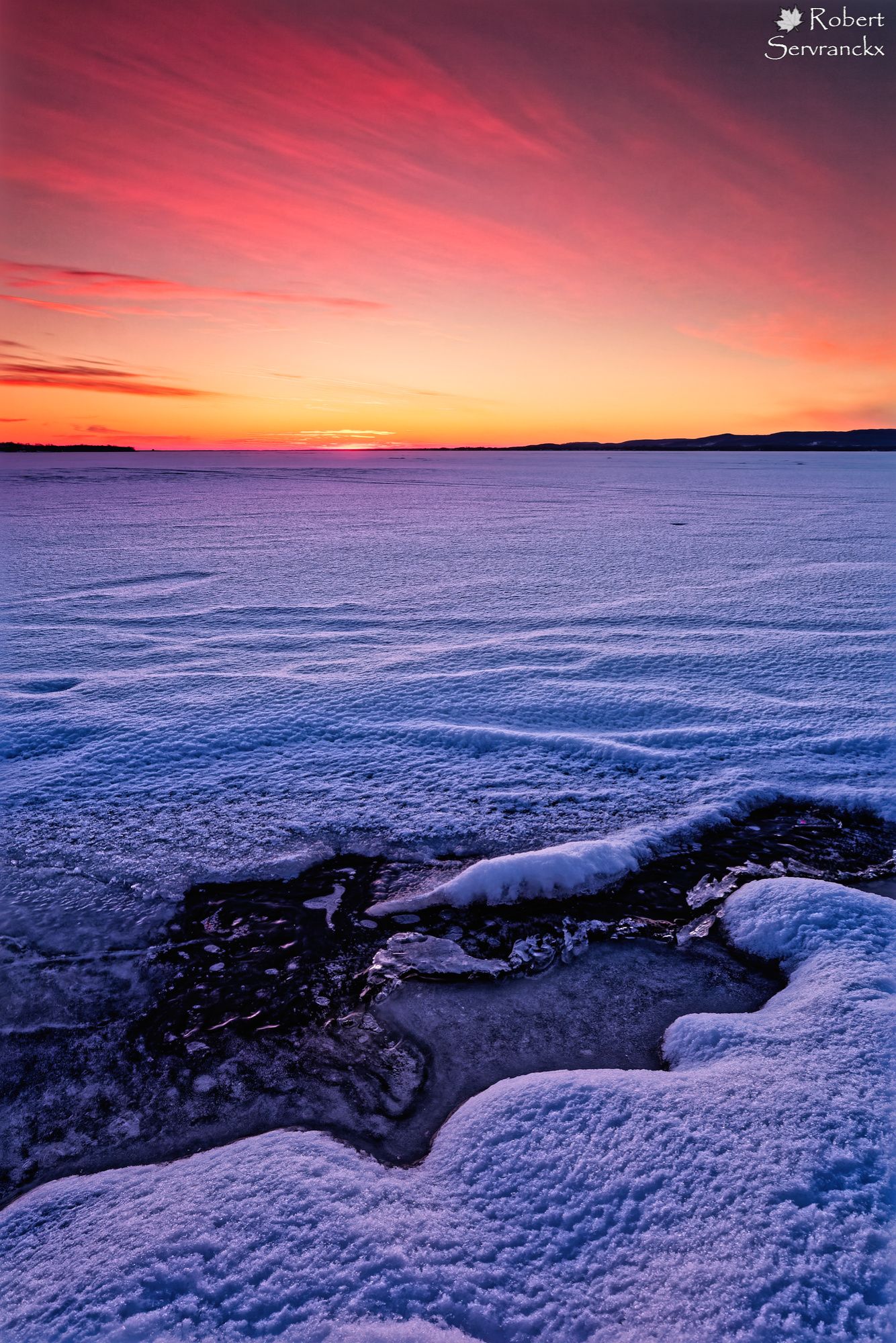 Winter Sunset over Lake of Two Mountains. Quebec - Coucher de soleil hivernal sur le Lac des Deux-Montagnes, Québec