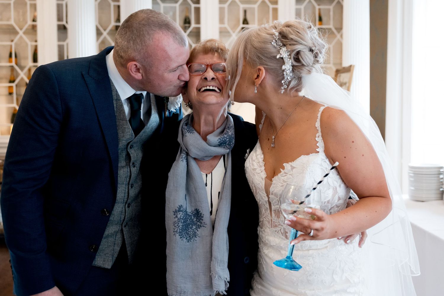Candid reception moments captured in natural light showing laughter and celebration.