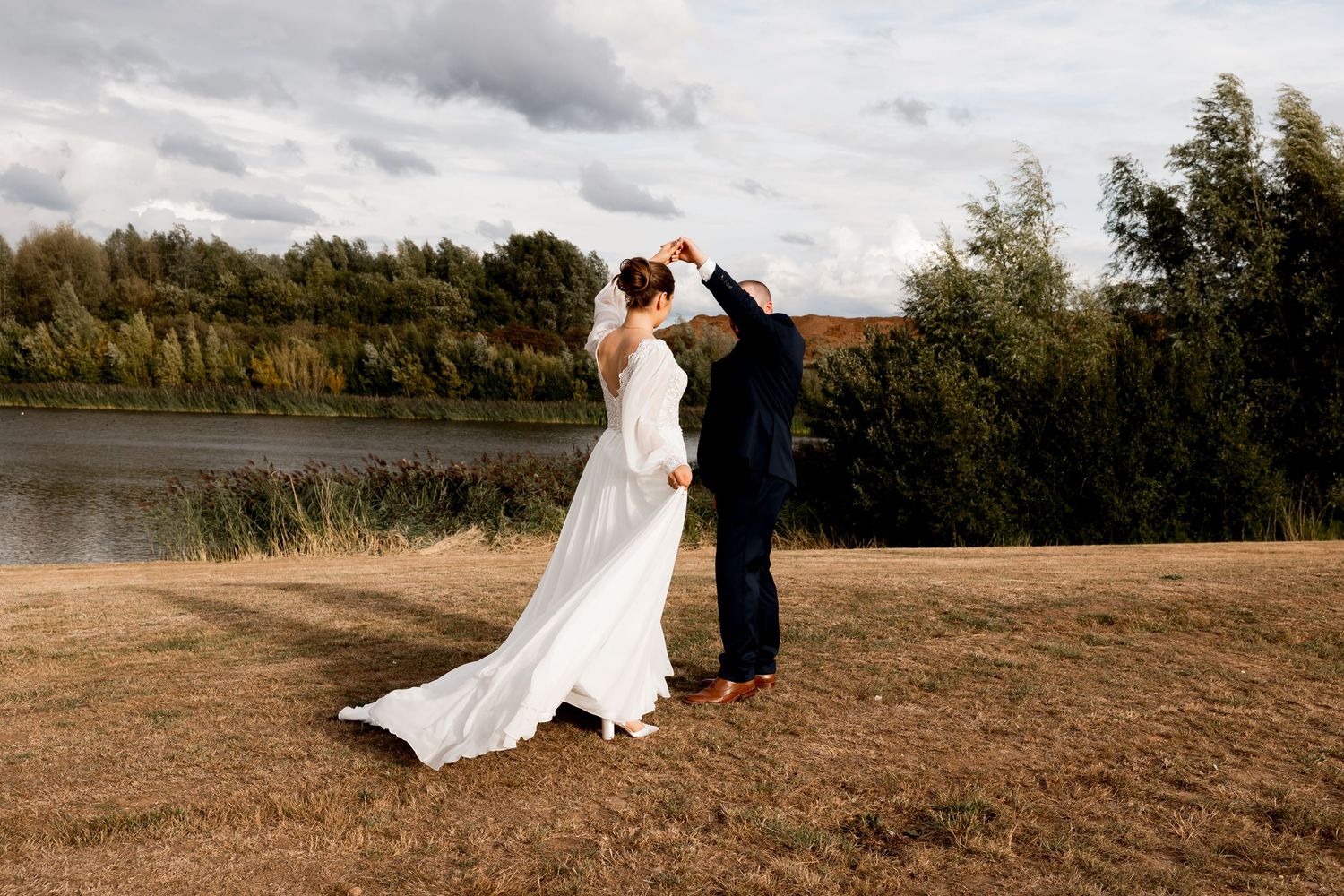 Panoramic wedding photos captured in a rustic outdoor setting near a lake.