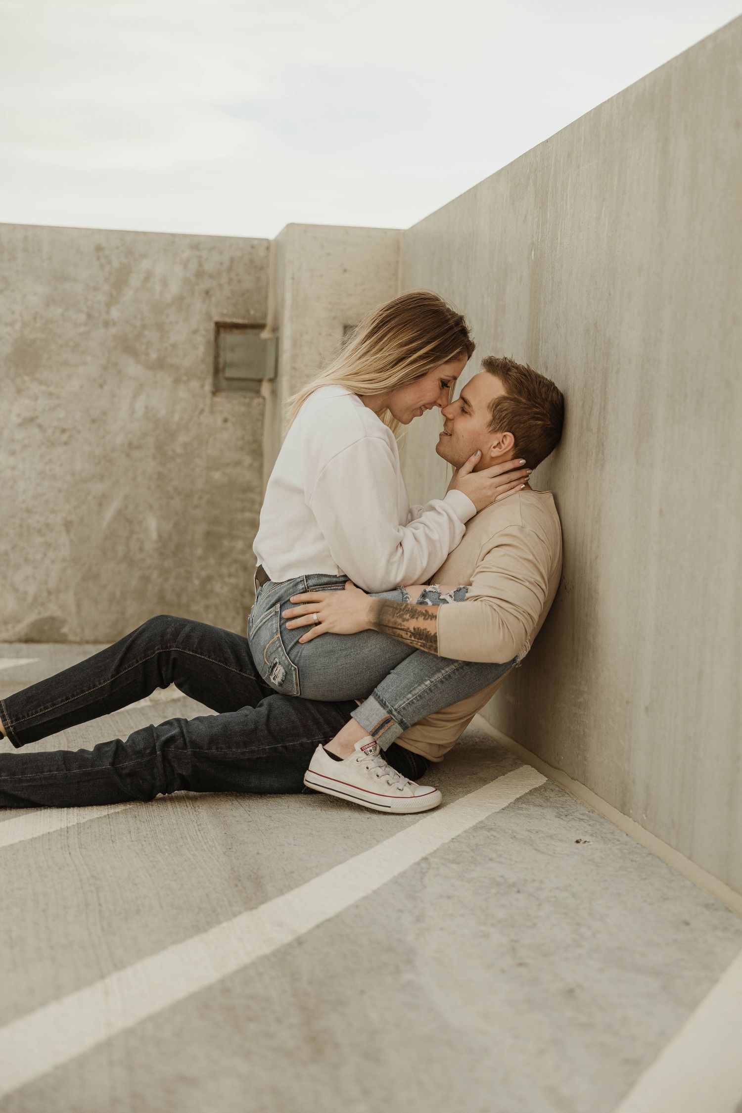 Garage style engagement couple photography session with professional photographer in Lethbridge