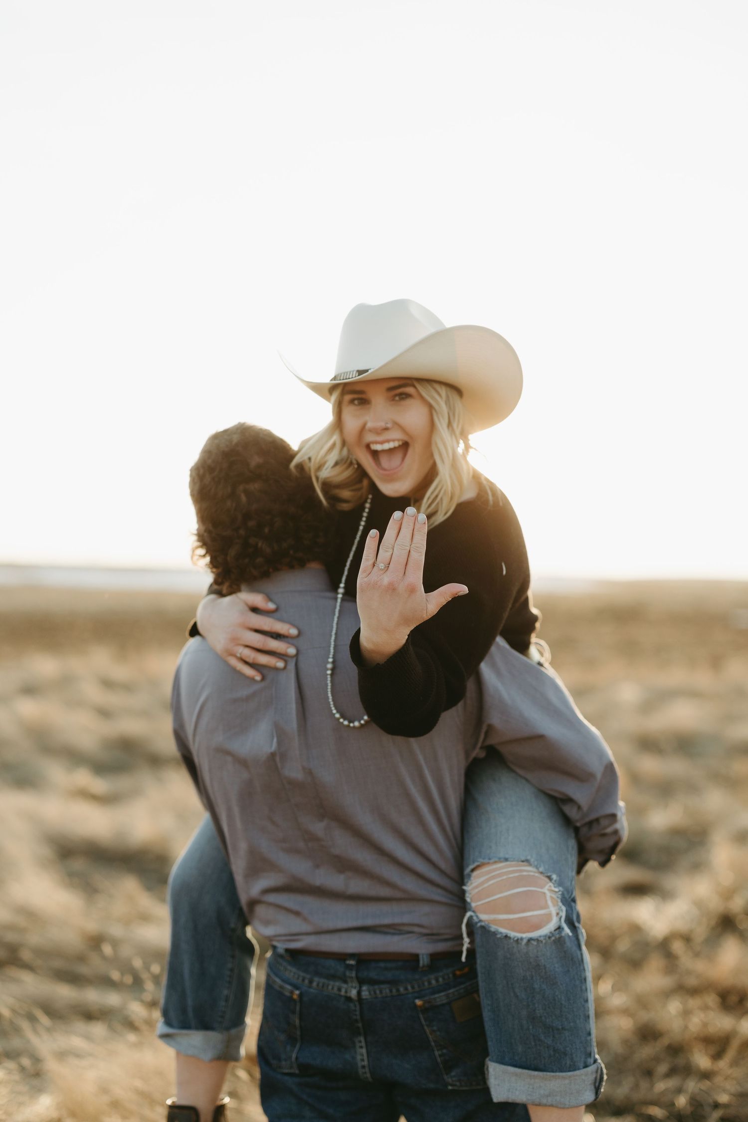 Western style engagement ranch farm session in New Dayton, AB.