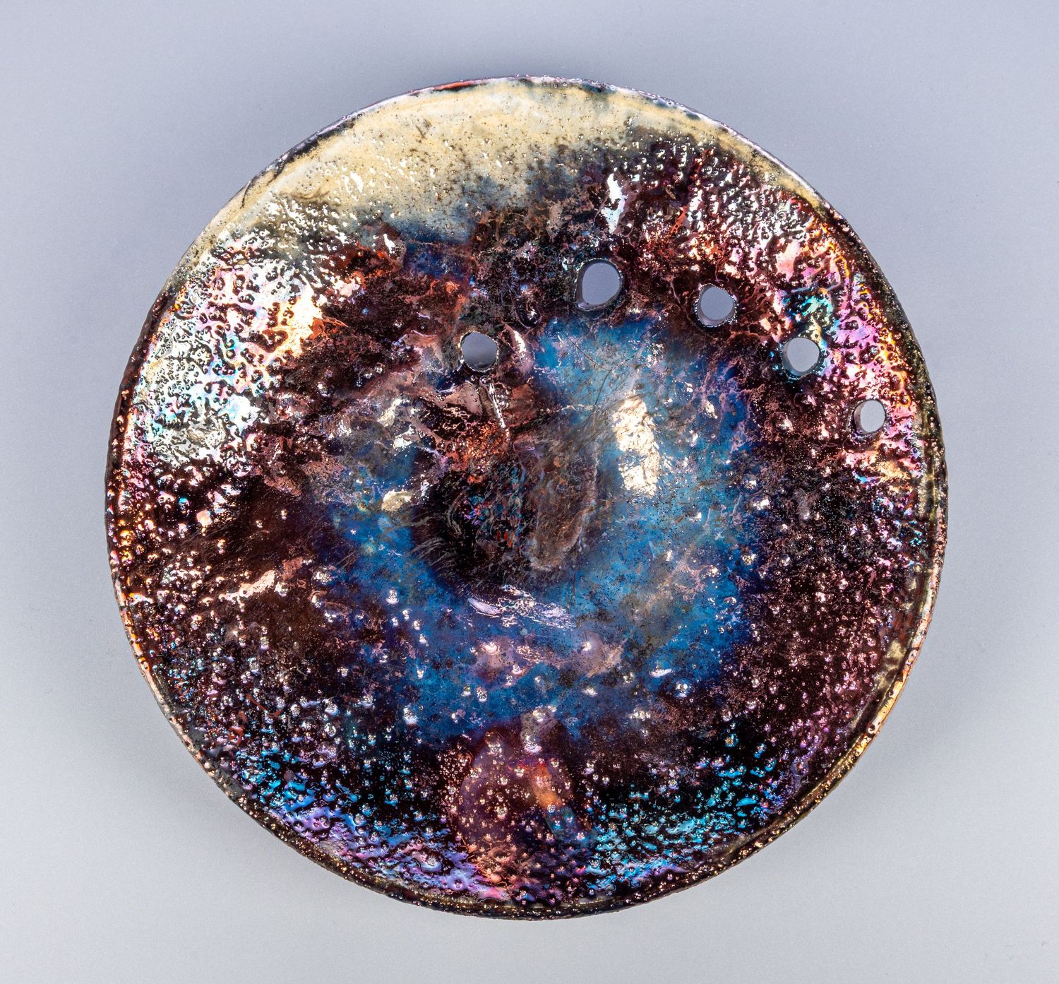 Image of a colorful plate on a white, grayish background, meant to be products that a company will be selling on their website.