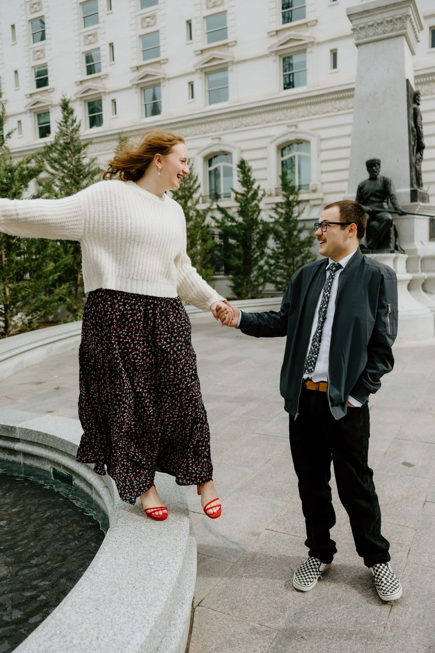 Series of photos showing two people dancing together on a concrete plaza.