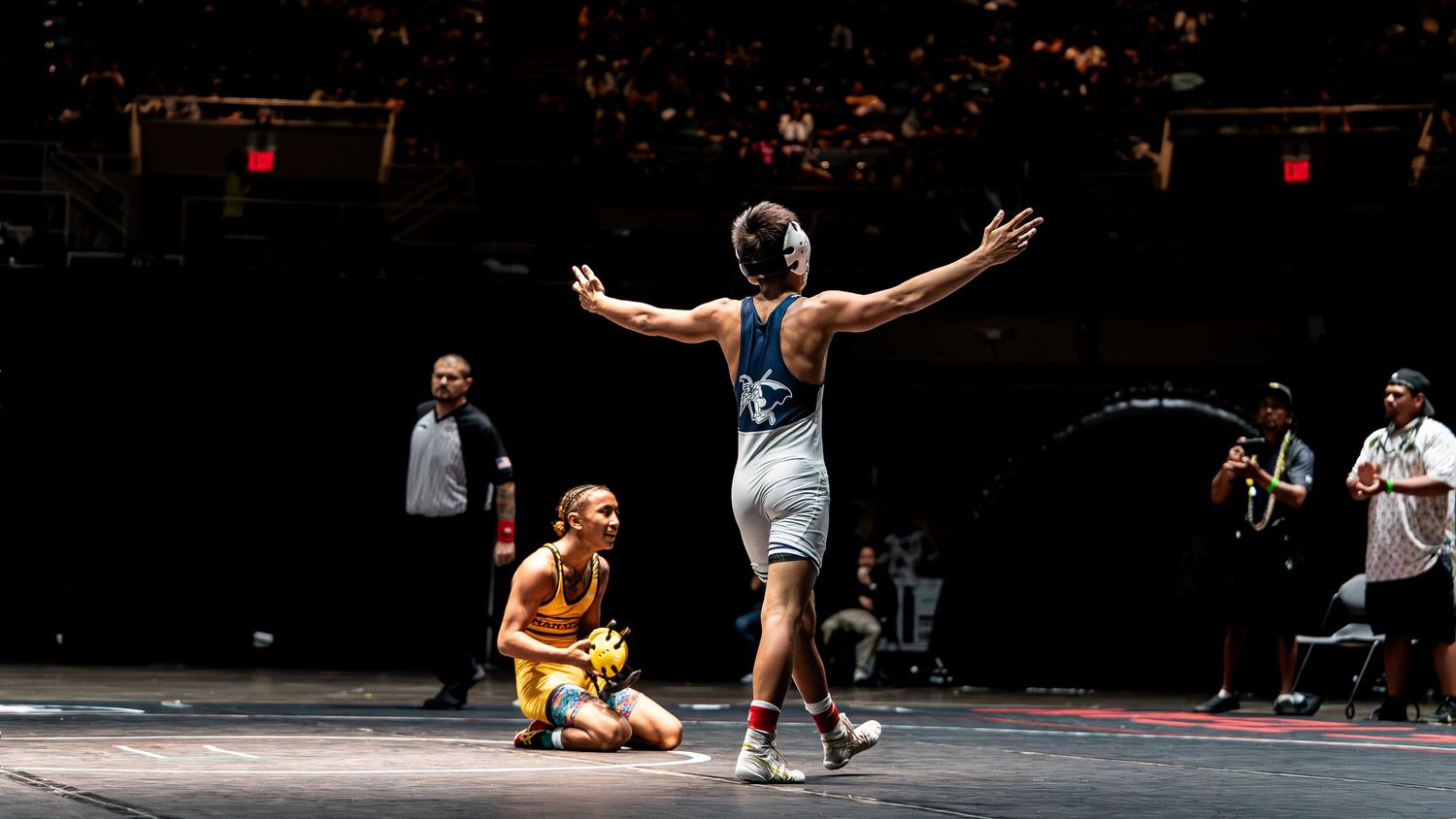 Basketball player driving to the basket during a winter game