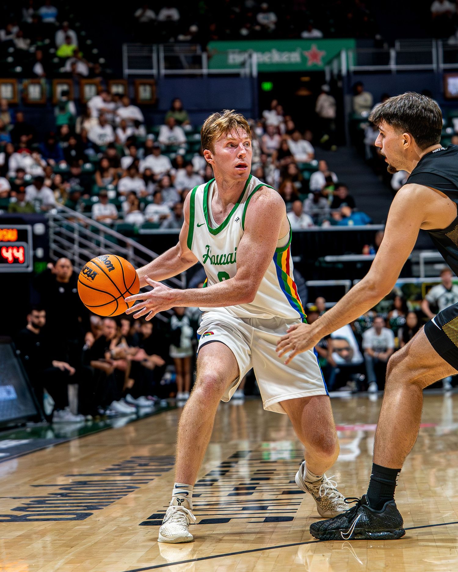Dramatic wrestling action shot from a Hawaii winter athletics tournament