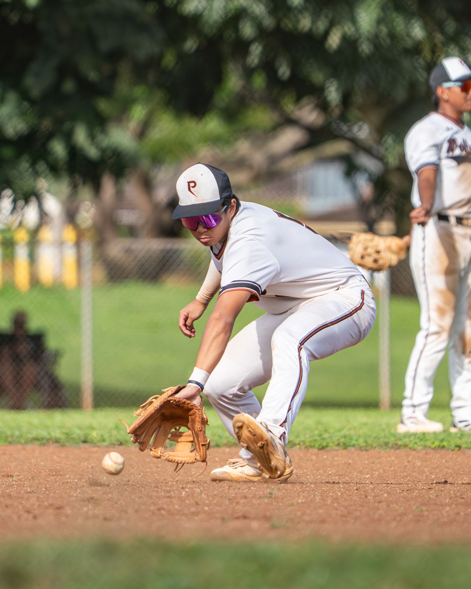 Volleyball player spiking the ball during a spring match in Hawaii