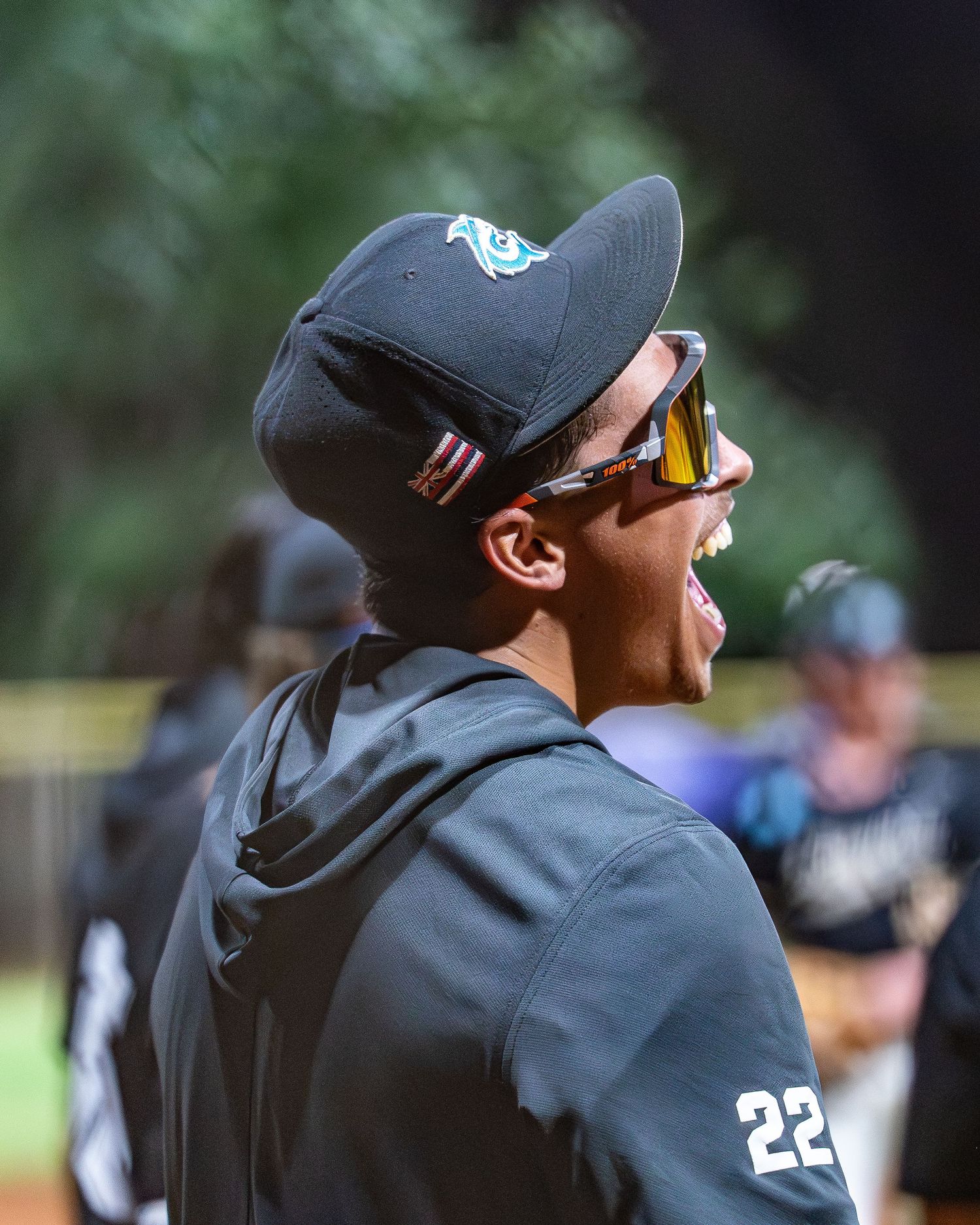 Volleyball player diving for a dig to keep a rally alive