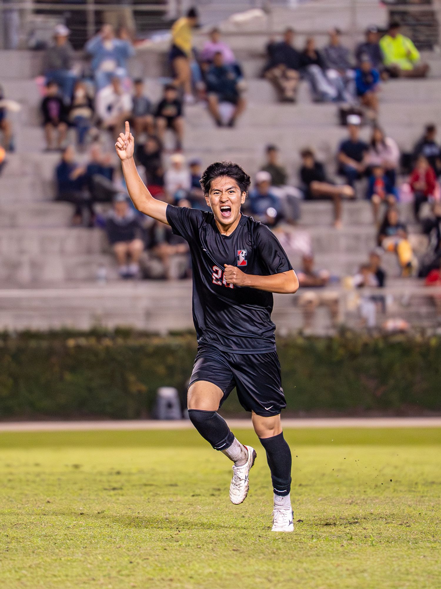 Dynamic soccer action shot from Hawaii fall season competition