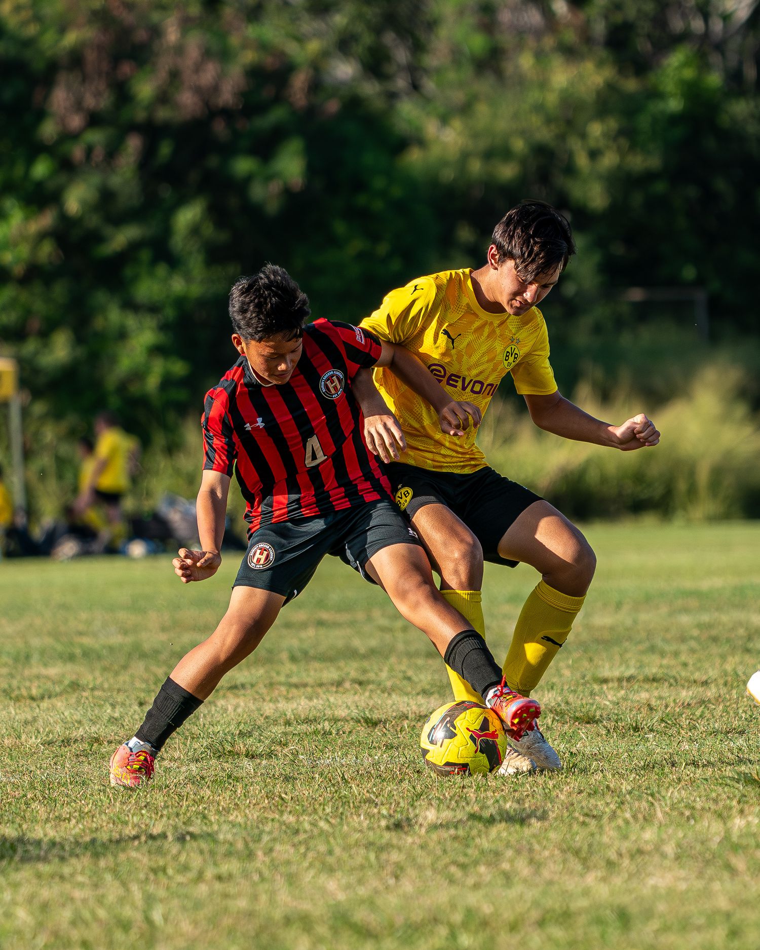 Soccer player heading the ball during a fall athletics match