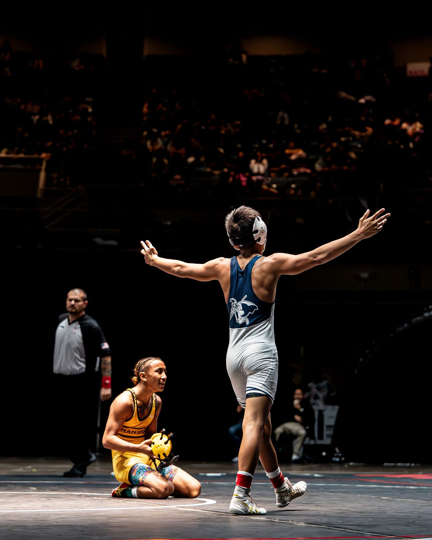 Basketball layup attempt during a Division I college game in Hawaii
