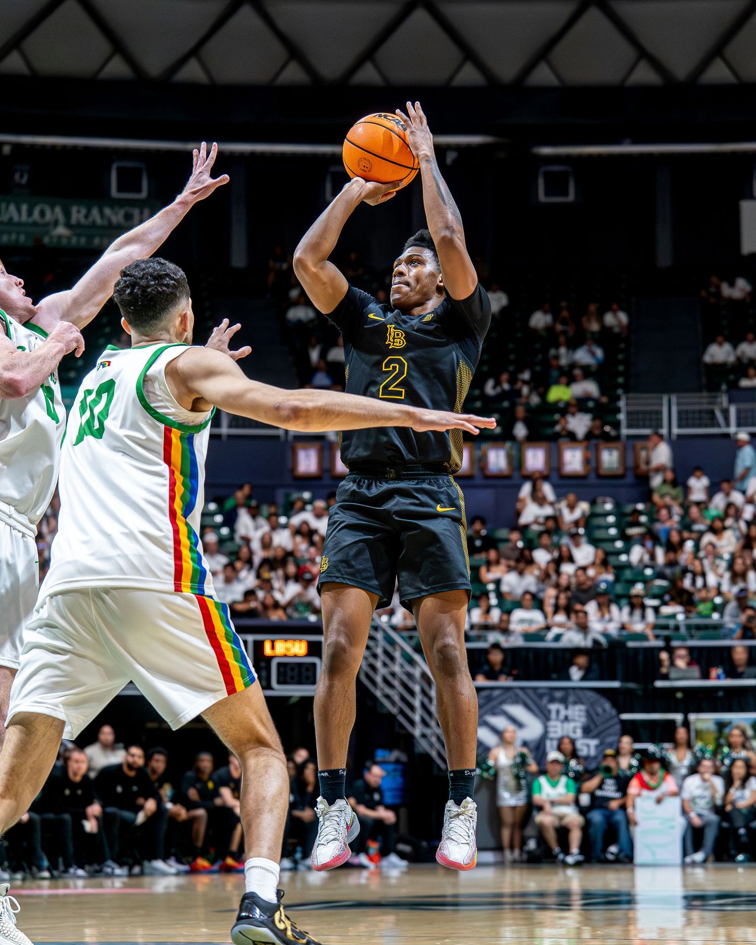 Basketball game action from a Hawaii high school winter competition
