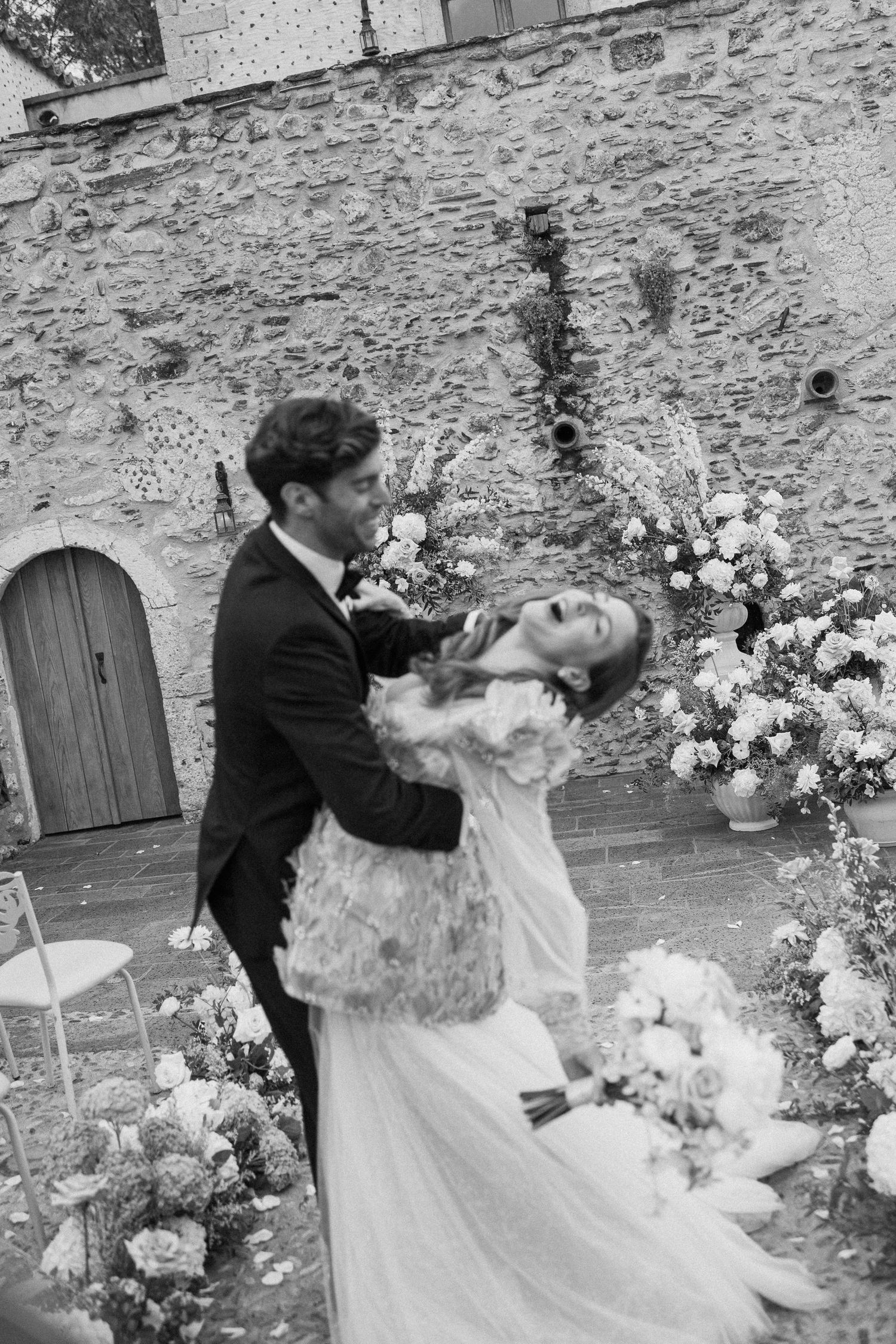 Luxury ceremony with couple walking down the aisle in Greece