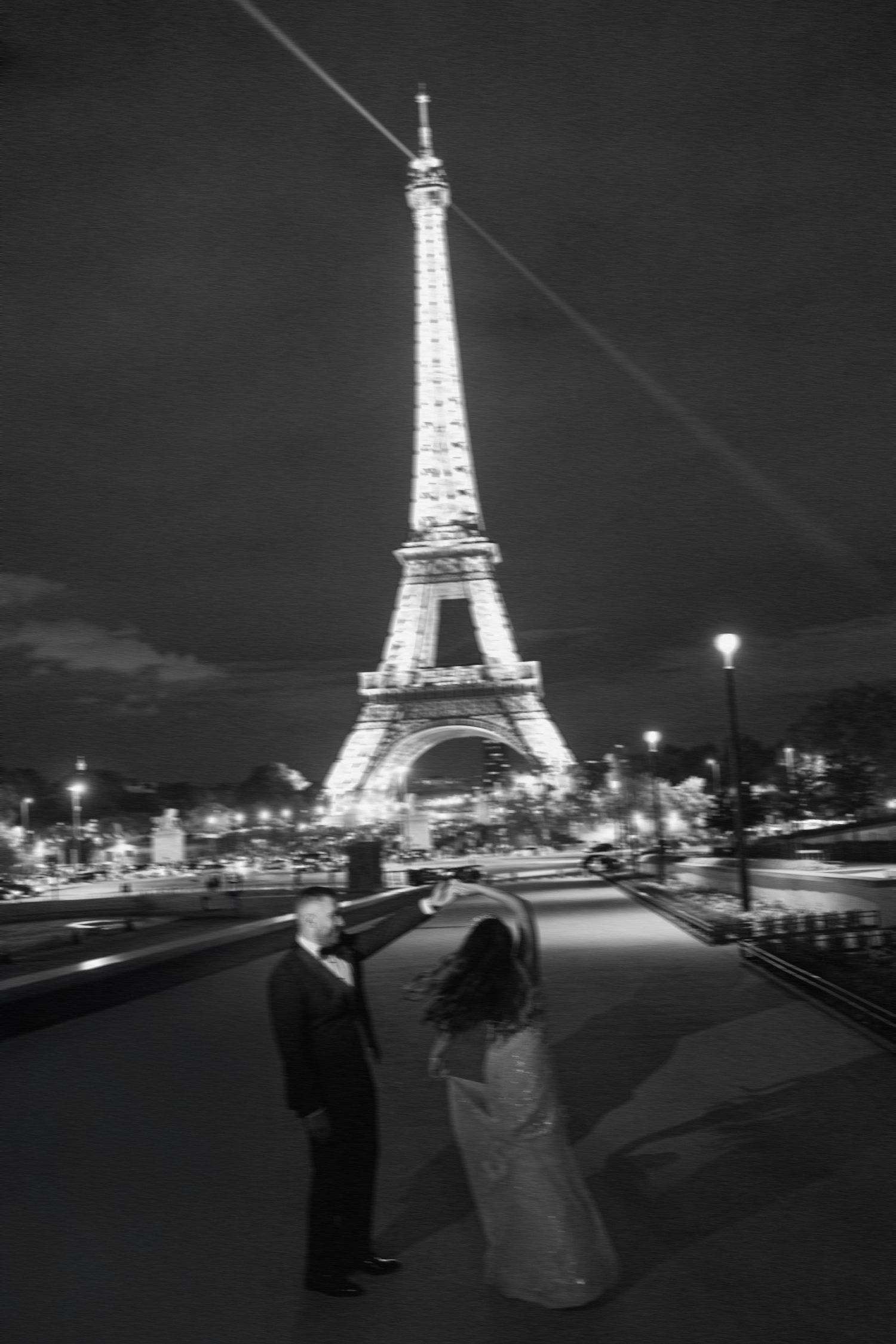 couple in paris getting photographed for their wedding