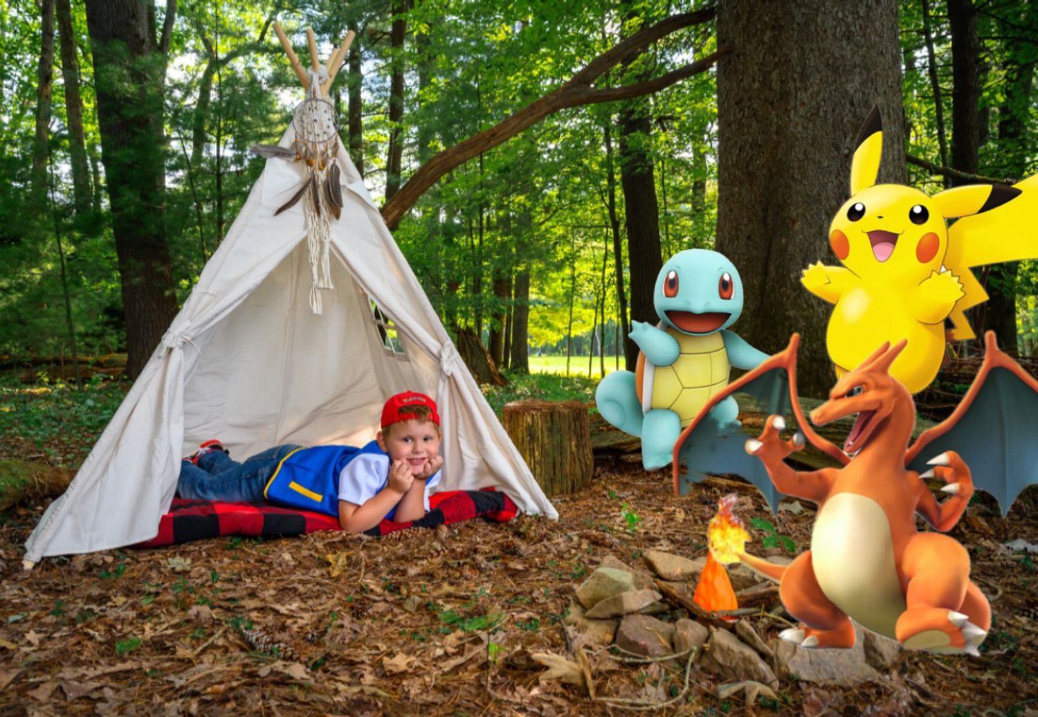 Child in Pokemon costume lying in a teepee tent outdoors, surrounded by Pikachu, Squirtle, and Charizard Pokemon characters.