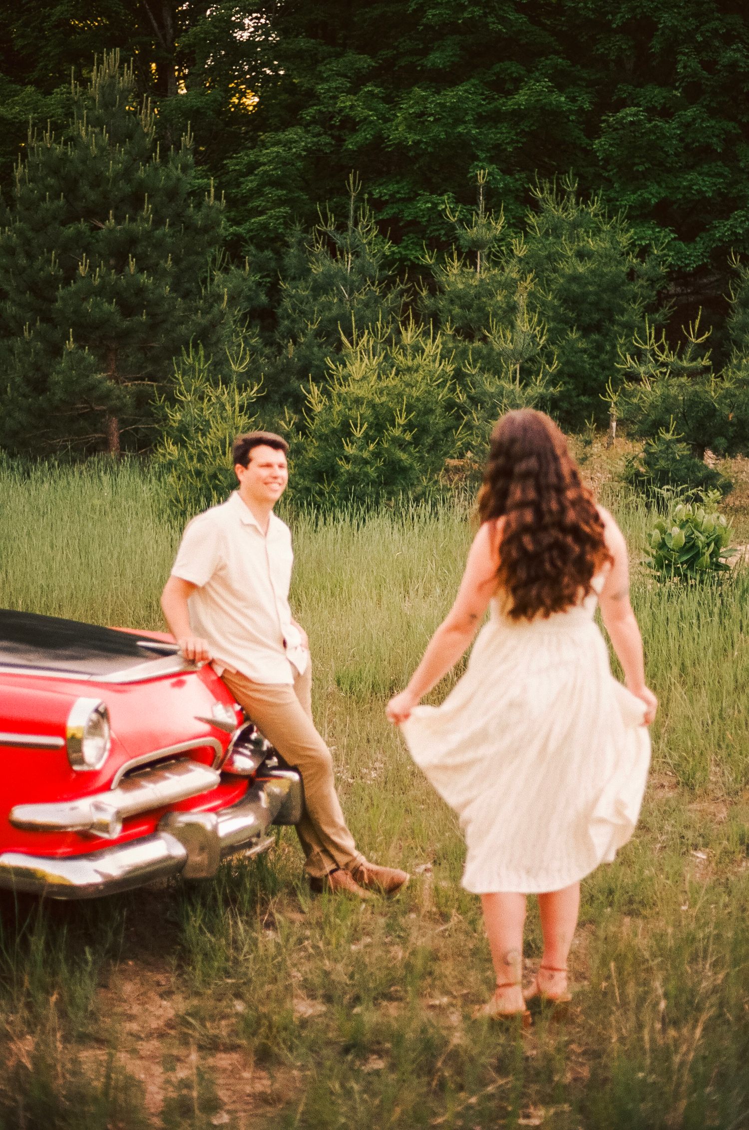 Romantic gentle summer engagement on 35MM film photographer northern Indiana candid documentary true to life golden sunlight lush greens