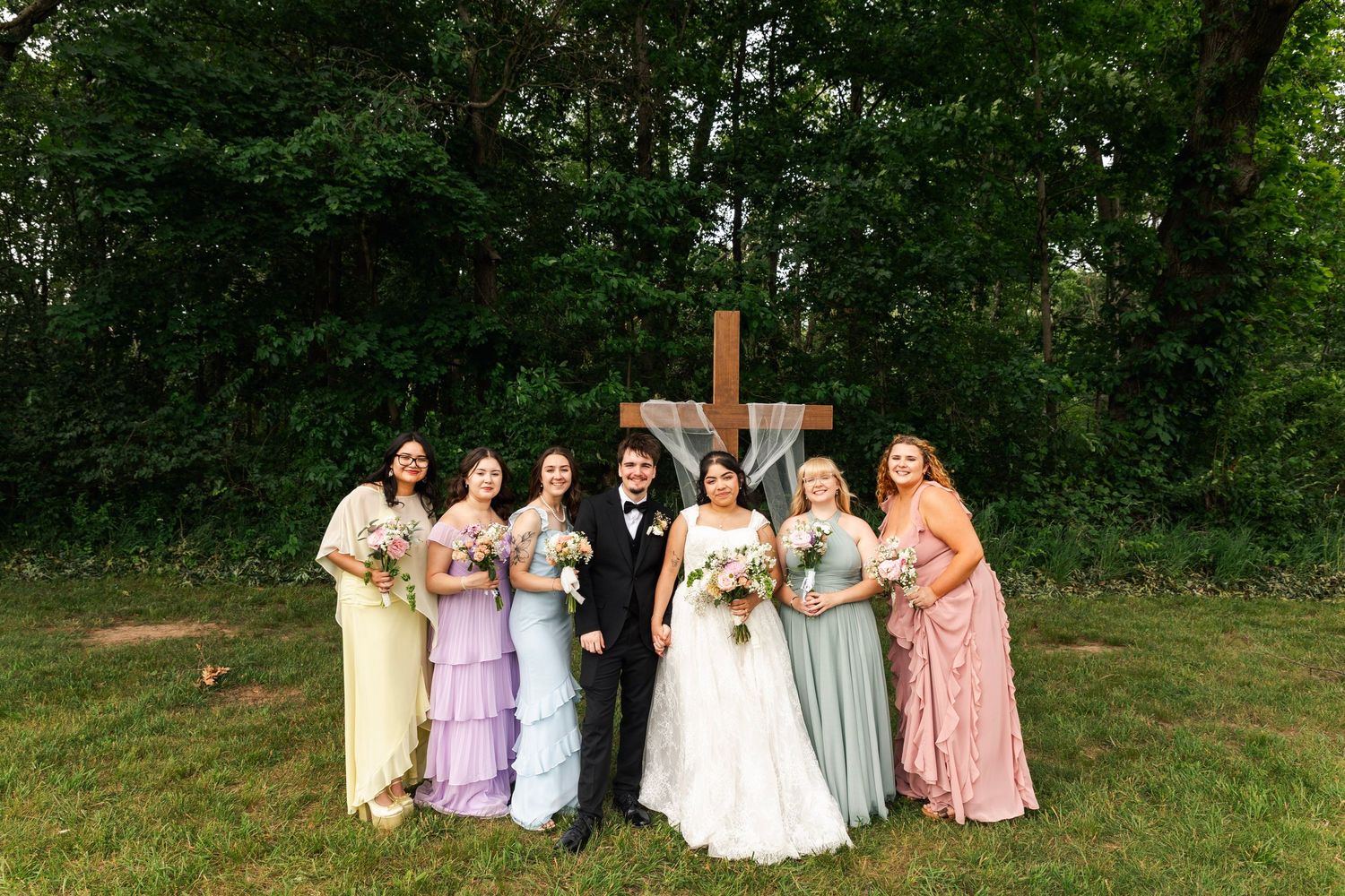 Romantic outdoor summer wedding on 35MM film photographer northern Indiana candid documentary true to life lush greens