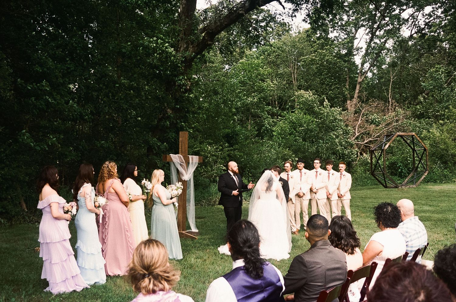 Romantic outdoor summer wedding on 35MM film photographer northern Indiana candid documentary true to life lush greens