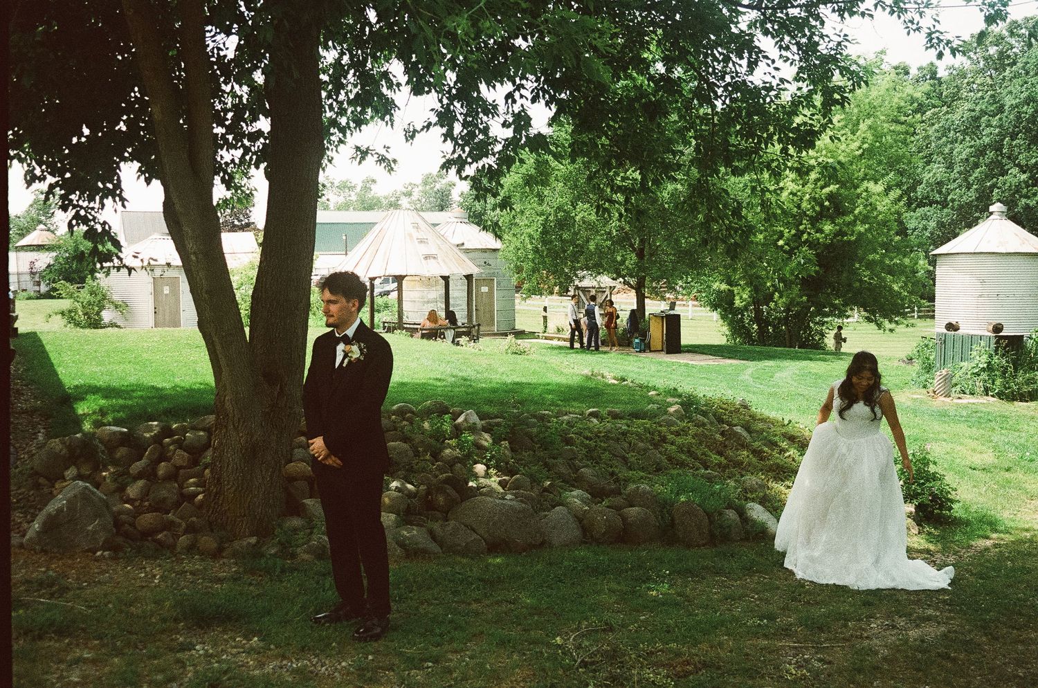 Romantic outdoor summer wedding on 35MM film photographer northern Indiana candid documentary true to life lush greens