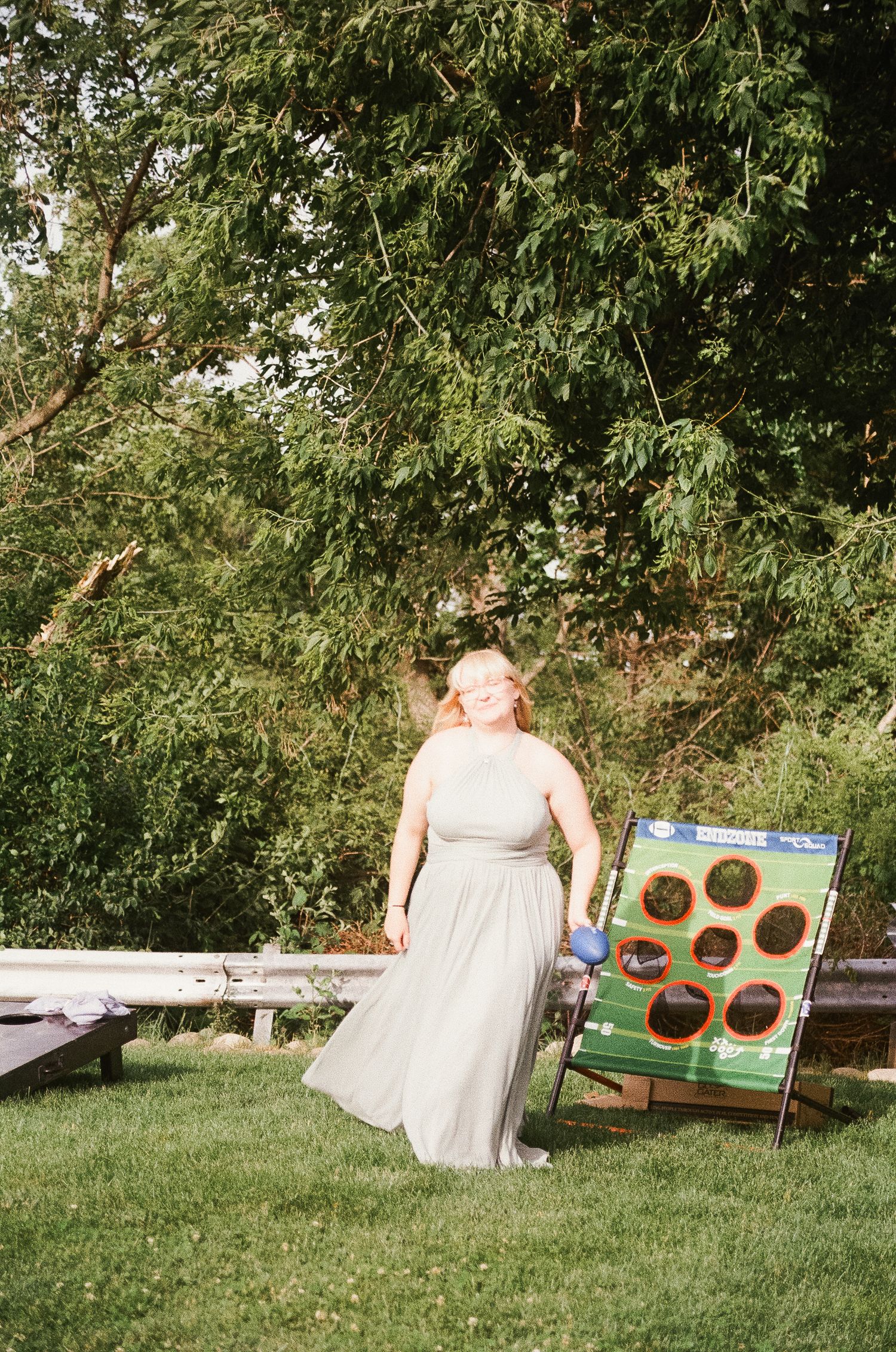 Romantic outdoor summer wedding on 35MM film photographer northern Indiana candid documentary true to life lush greens
